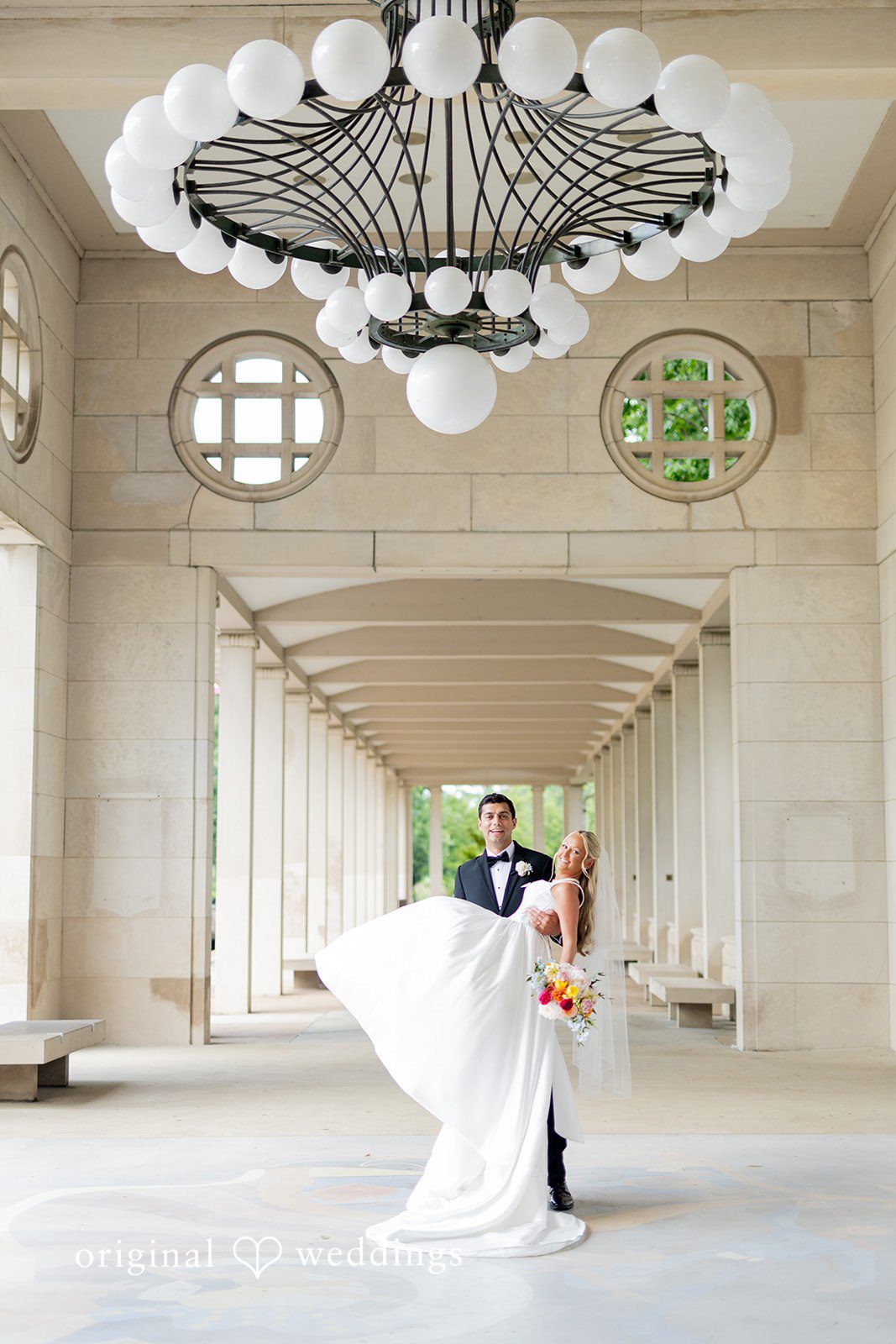 Maret + David A stunning portrait of the couple in the hallway at The Coronado