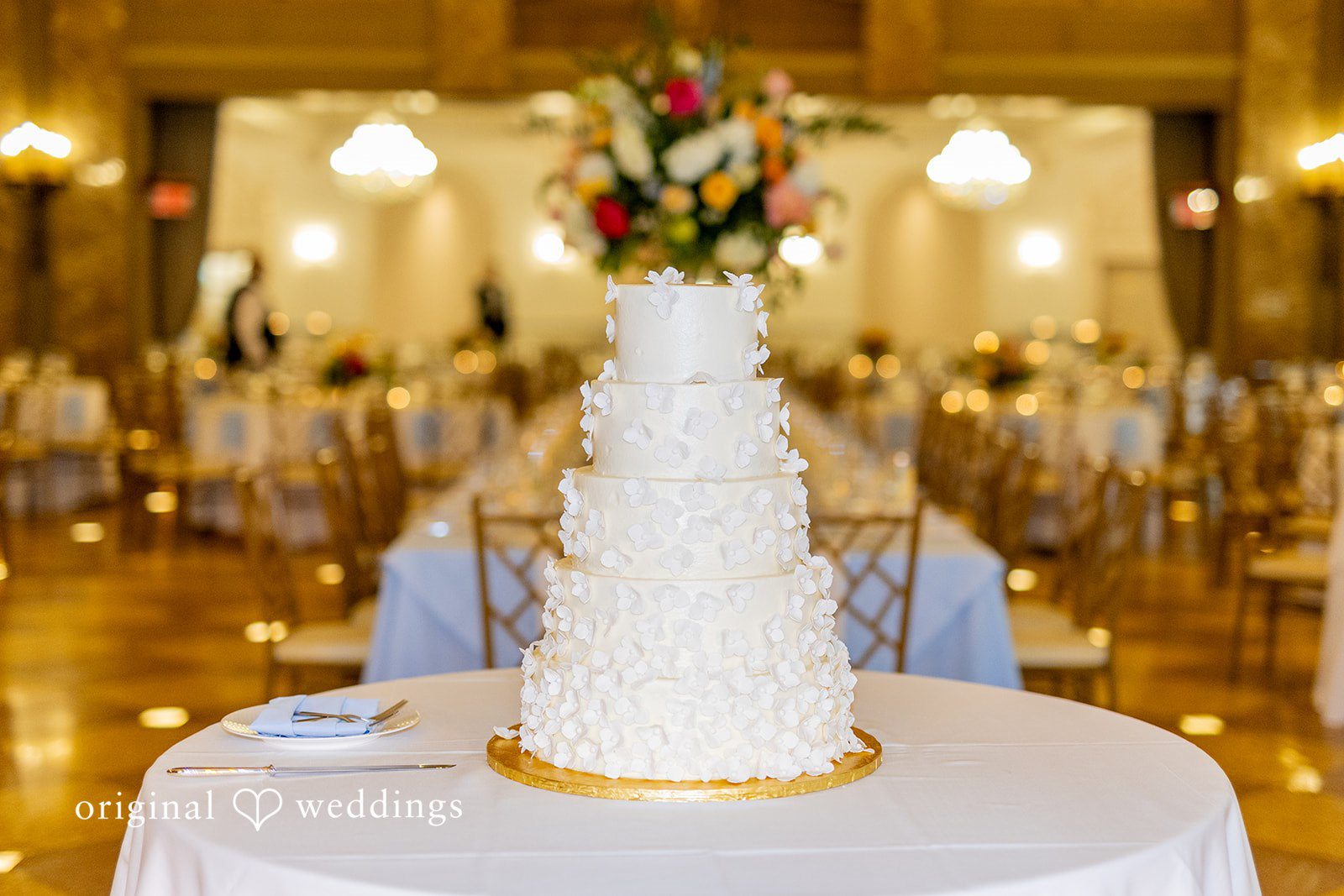Maret + David An all-white wedding cake