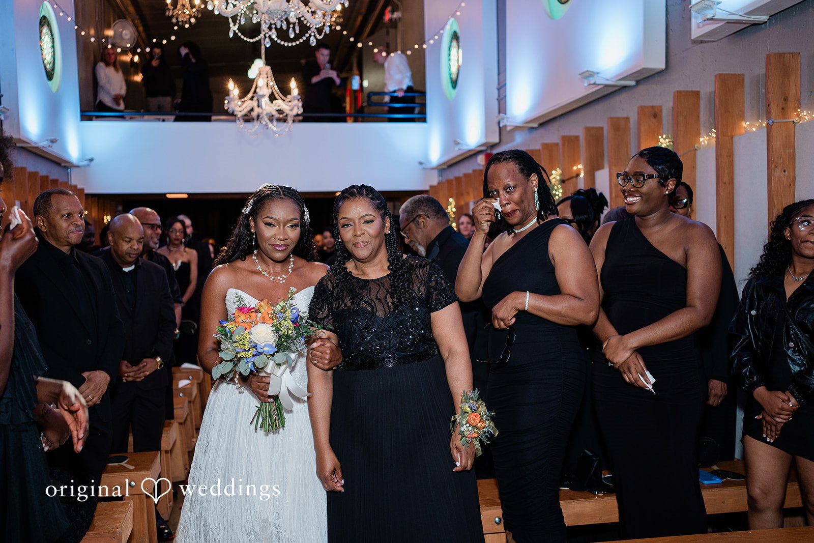Khanyile + Shontel Bride and her mother walking toward the ceremony aisle