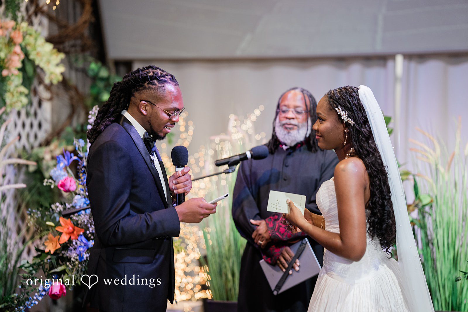 Khanyile + Shontel Groom reading his vows to the bride during the ceremony