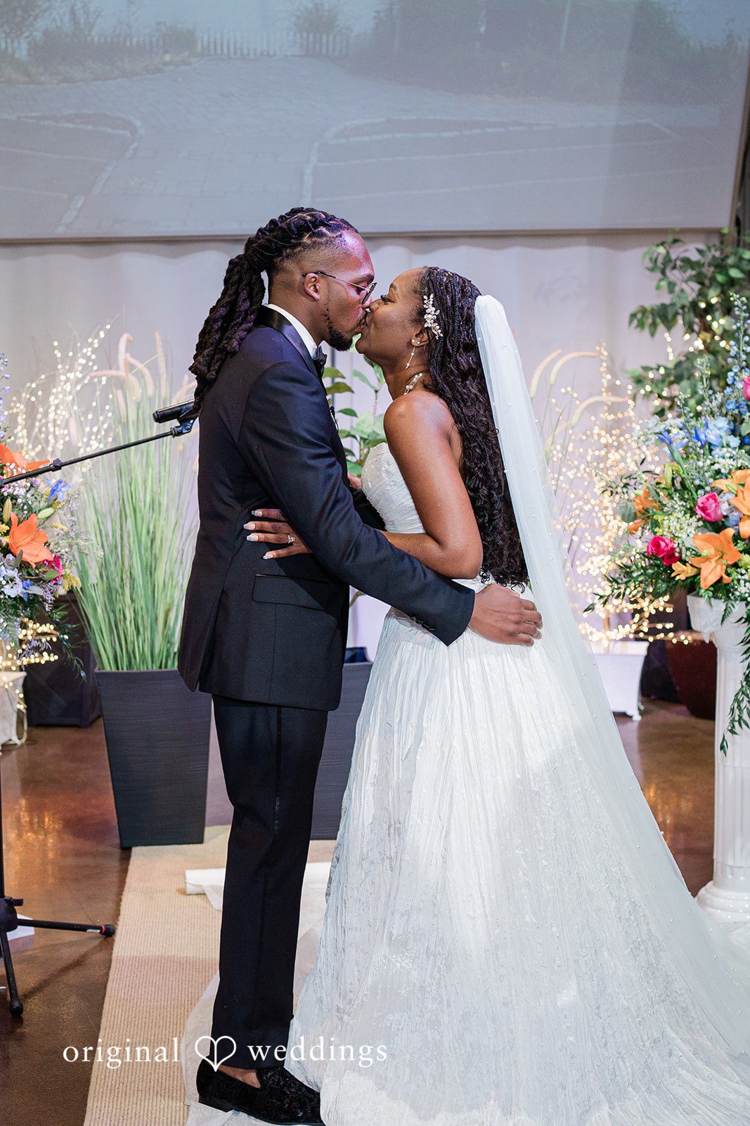 Khanyile + Shontel Bride and groom sharing their first kiss after the vows