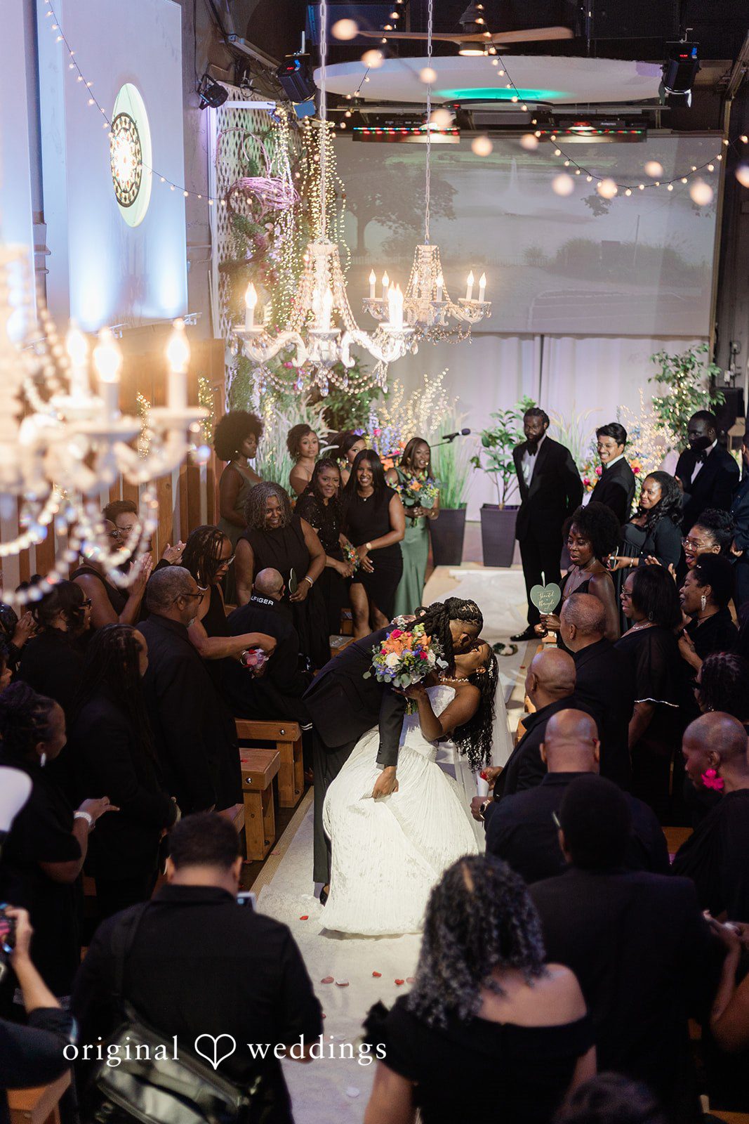Khanyile + Shontel Wide view of the couple leaving the ceremony together