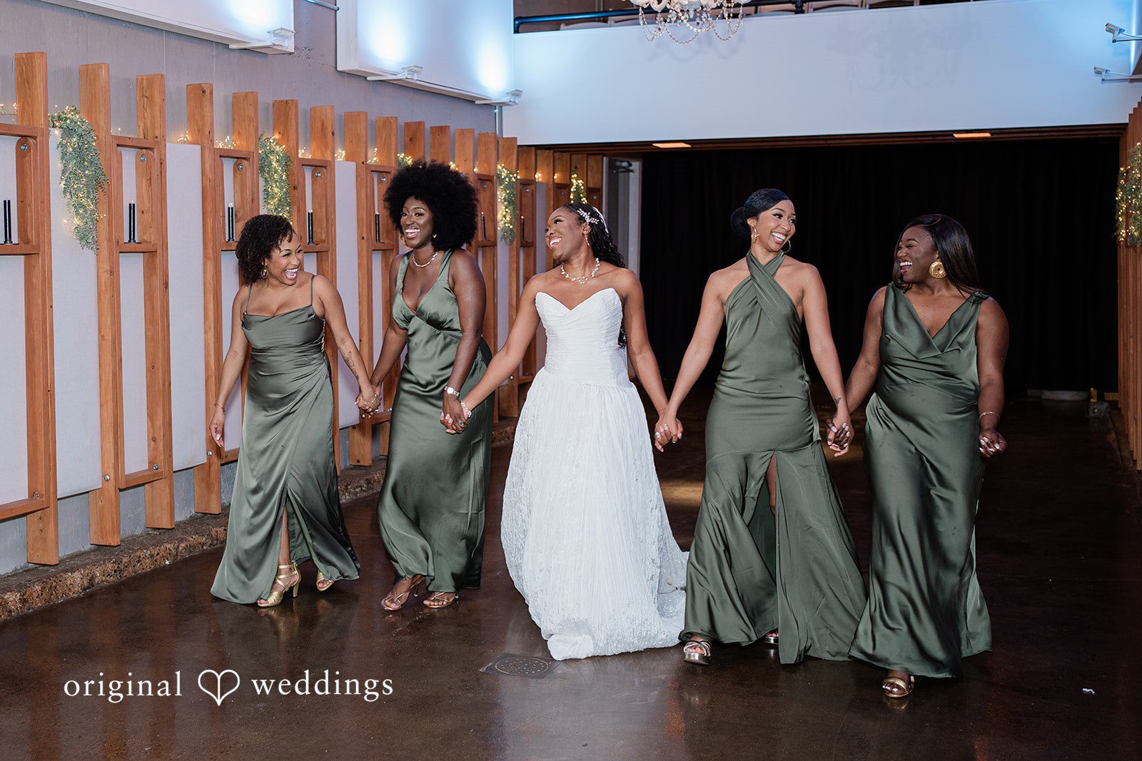 Khanyile + Shontel Bride walking with her bridesmaids before the ceremony