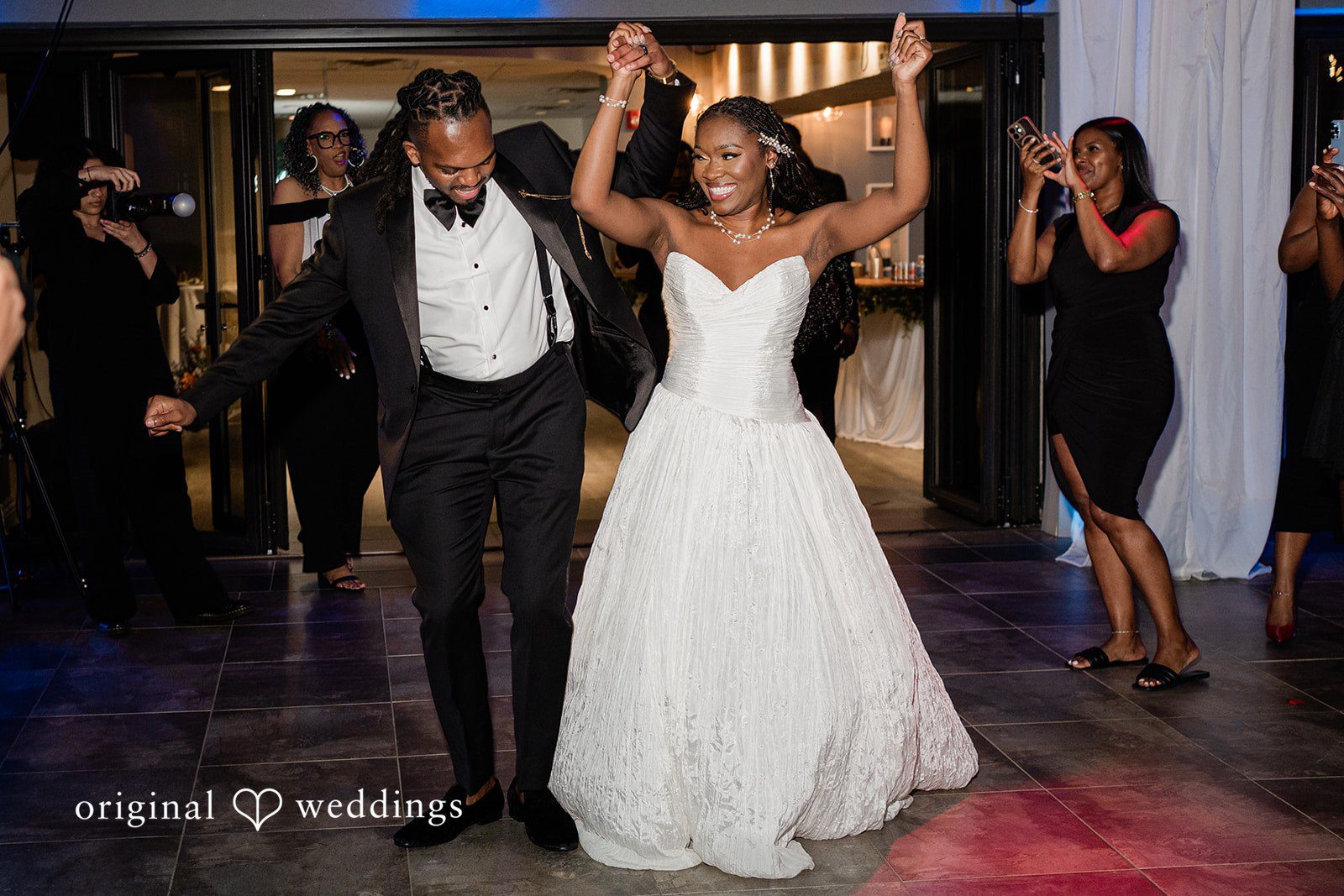 Khanyile + Shontel Bride and groom enjoying the reception with guests