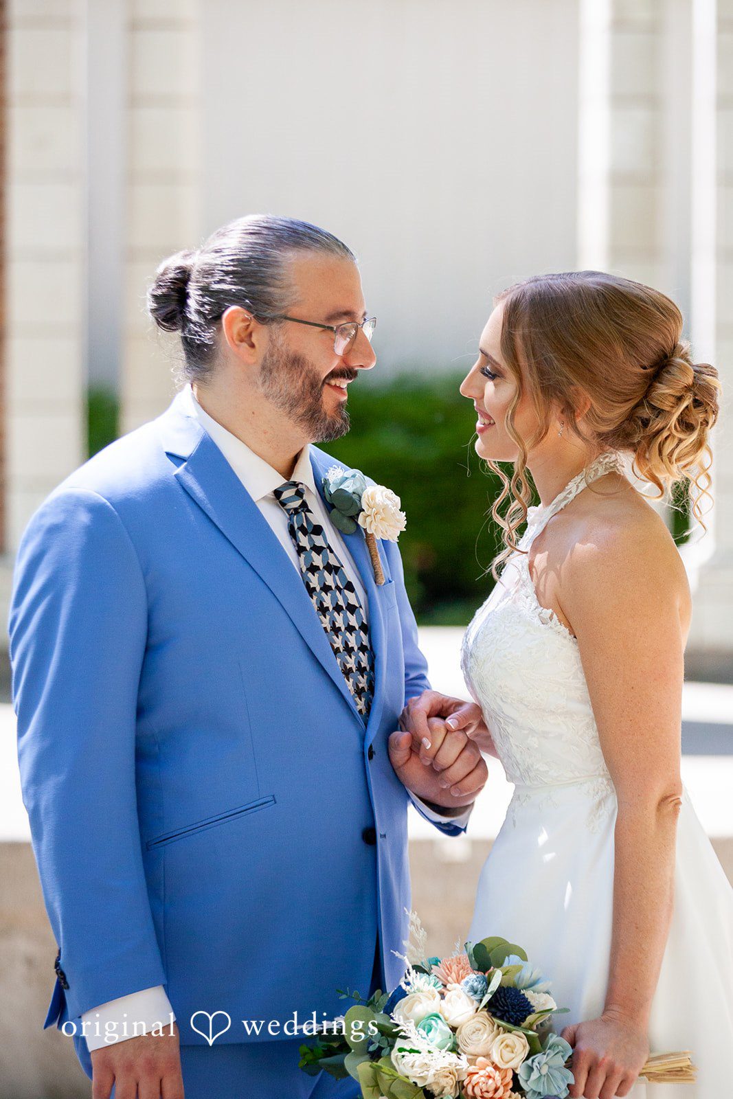 Sasha + Tom Seattle Wedding Photographers capturing couple looking at each other at The Great Hall at Green Lake by Original Weddings