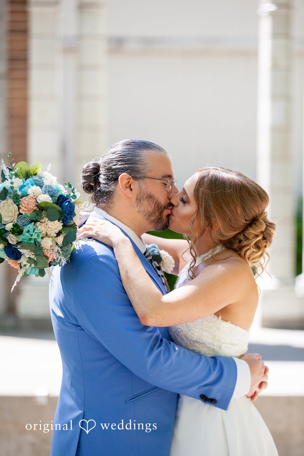 Sasha + Tom Couple kiss photography at The Great Hall at Green Lake