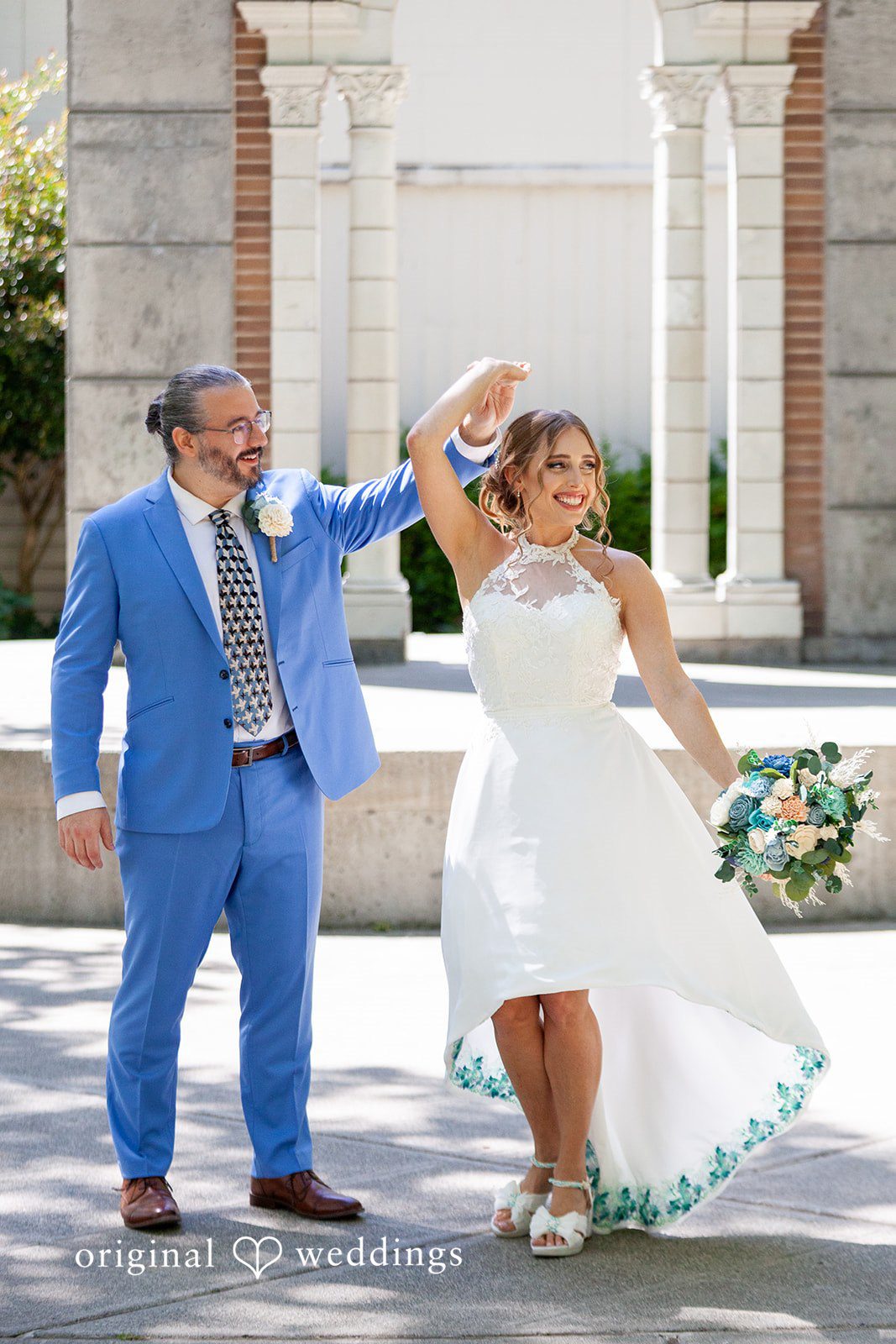 Sasha + Tom Bride and groom smiling together at The Great Hall at Green Lake