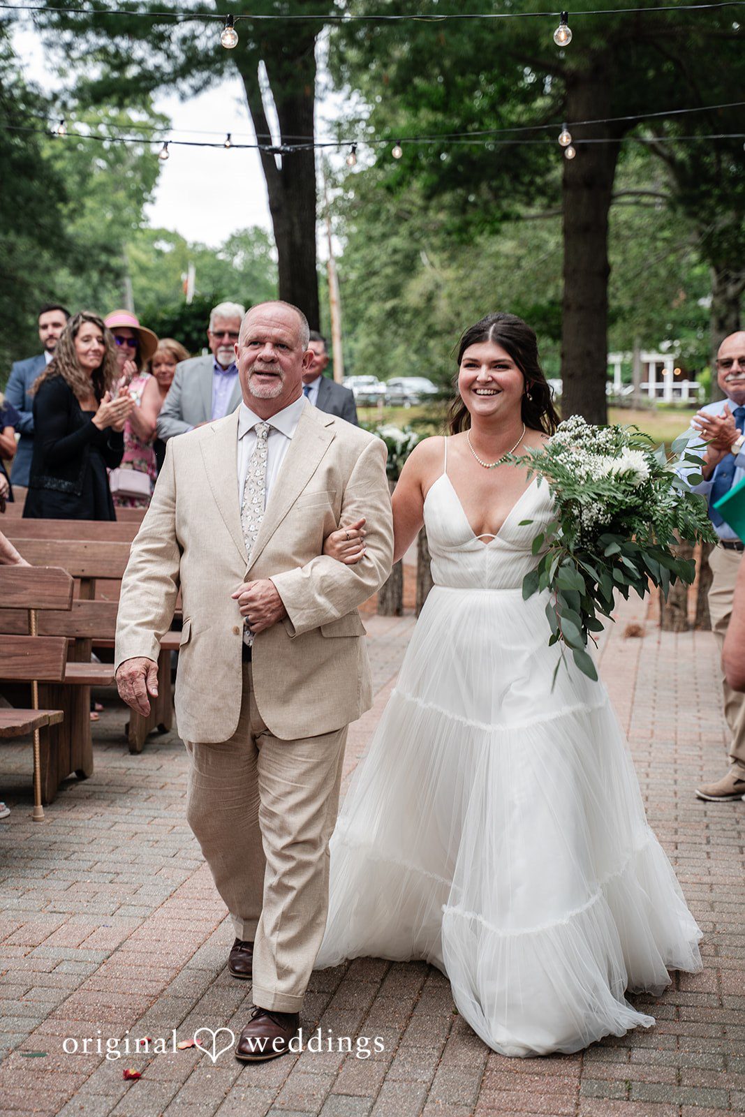 Emotional moment as the bride walks down the aisle toward her groom