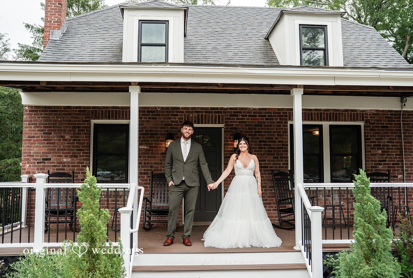Bride and groom standing outside The Pavilion on Crystal Lake captured by Hartford CT Wedding Photographers from Original Weddings.