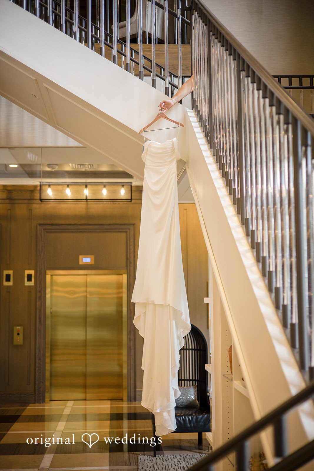 Kimberly + Jordan Bride's wedding gown beautifully displayed before the ceremony at The Riverview