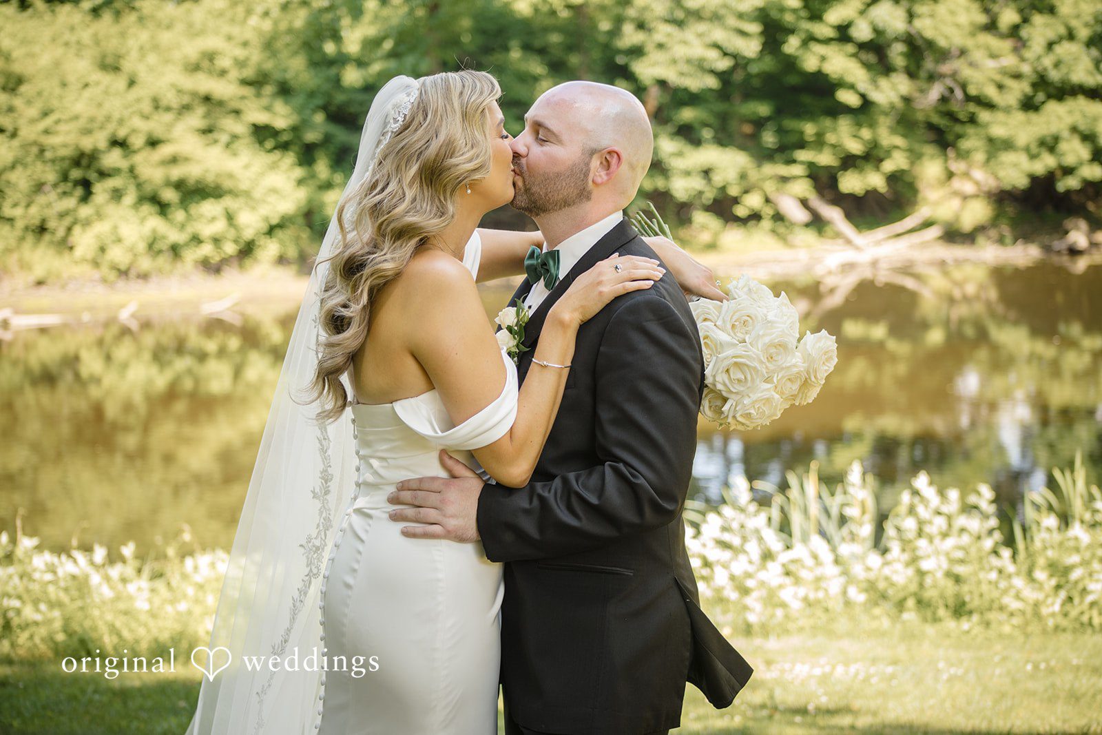 Kimberly + Jordan Romantic moment of bride and groom kiss