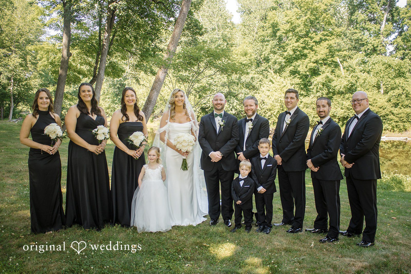 Kimberly + Jordan Elegant group wedding picture outside at The Riverview captured by Hartford CT Wedding Photographers from Original Weddings