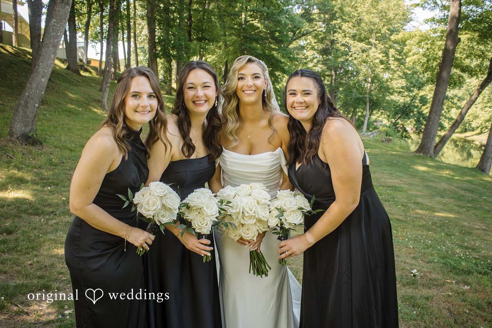Kimberly + Jordan Bride with bridesmaids sharing joyful moments before the ceremony