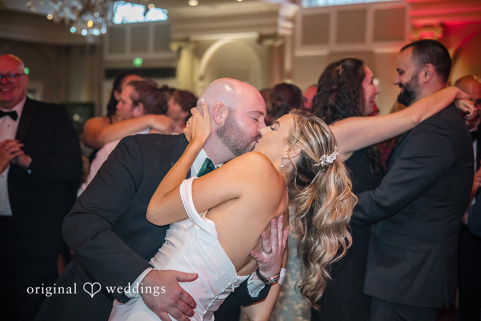 Kimberly + Jordan Bride and groom sharing a kiss during dance