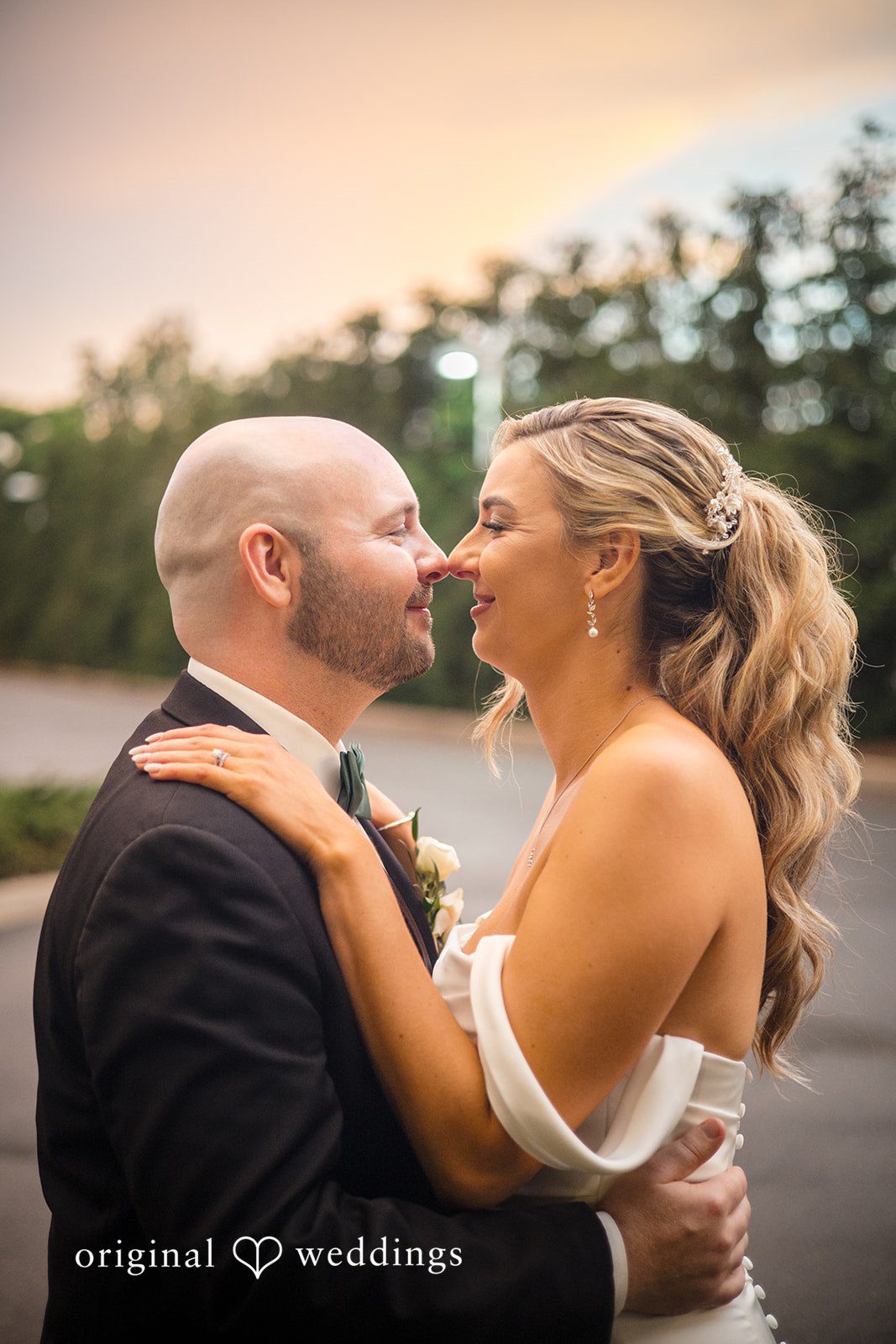 Kimberly + Jordan Romantic portrait of the couple at The Riverview