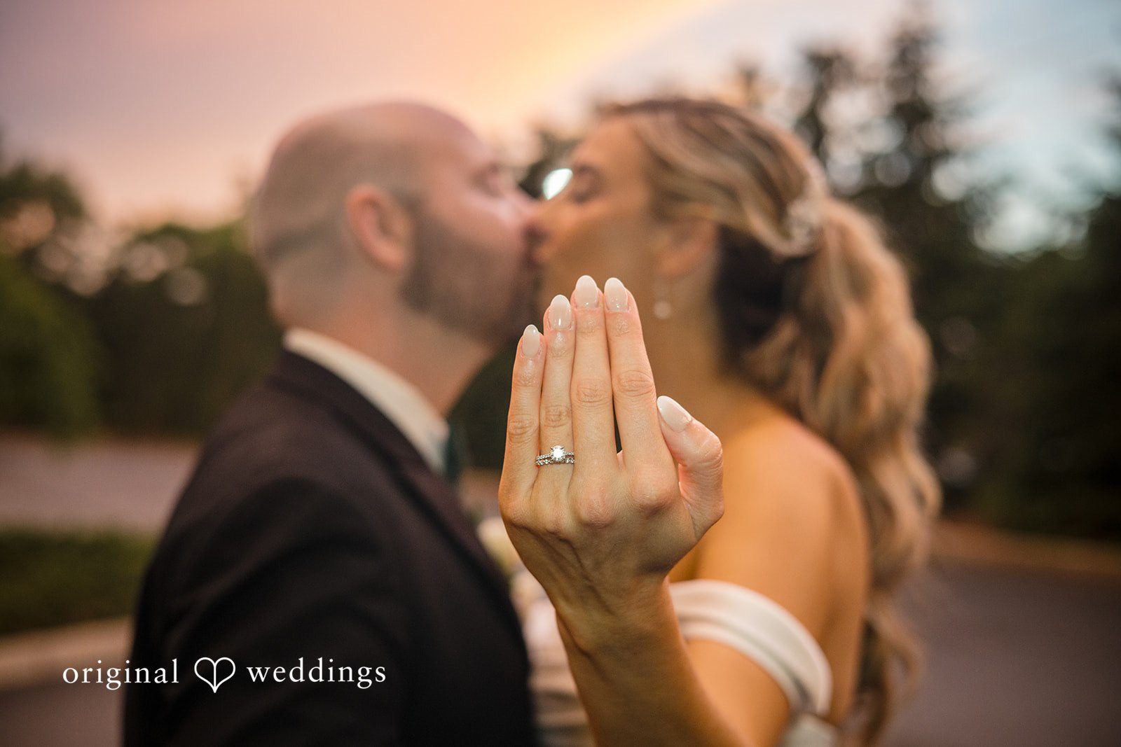 Kimberly + Jordan Close up of bride show wedding ring