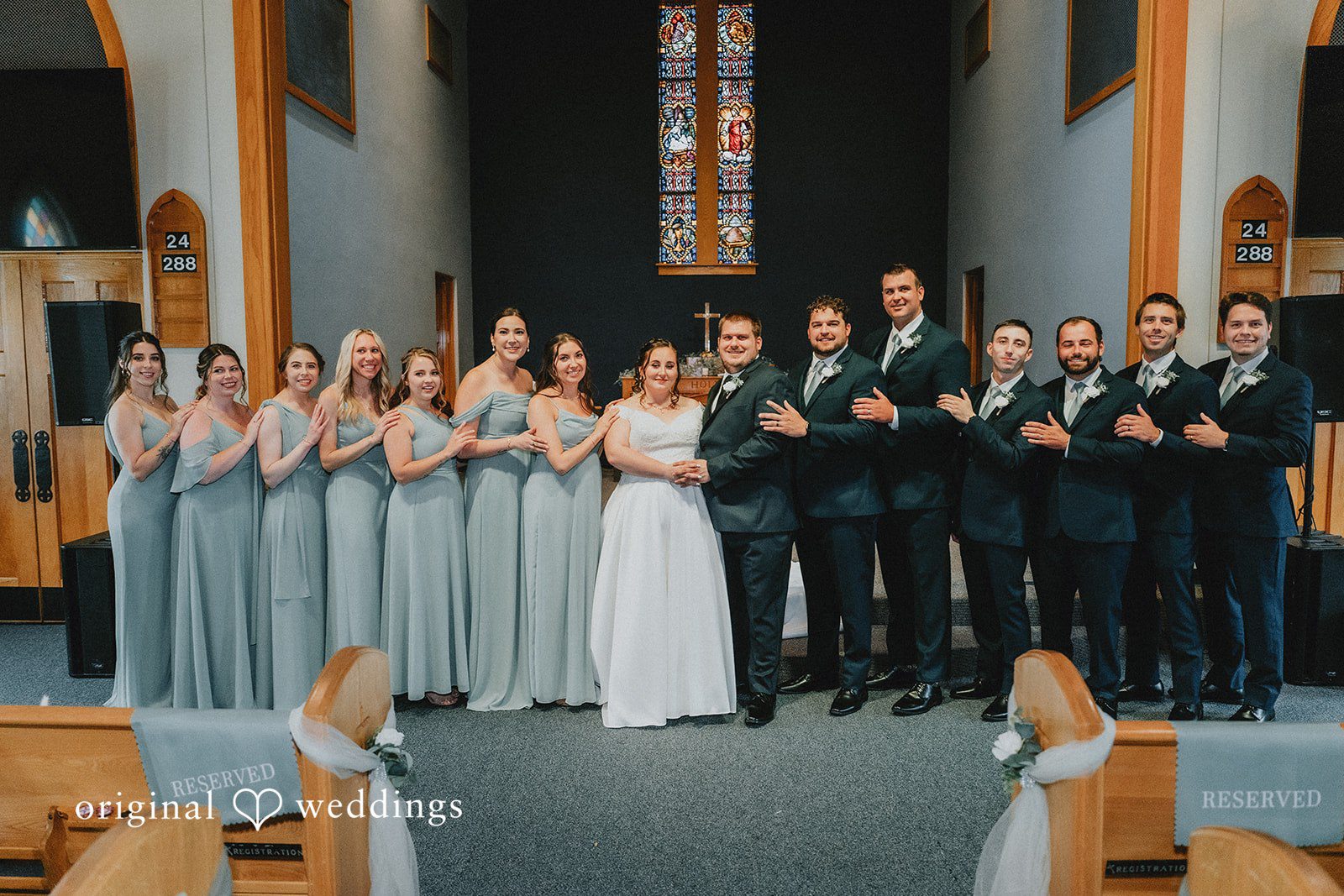 Kevin + Brooke Group picture of couple with bridesmaids and groomsmen at The Seville