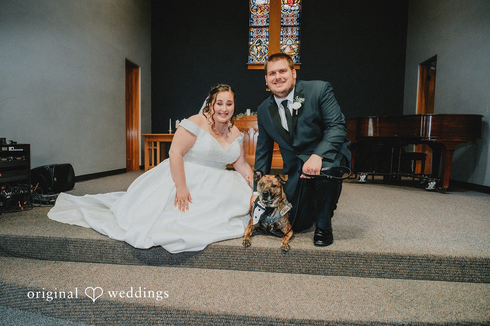 Kevin + Brooke Beautiful picture of bride and groom with the pet dog at The Seville