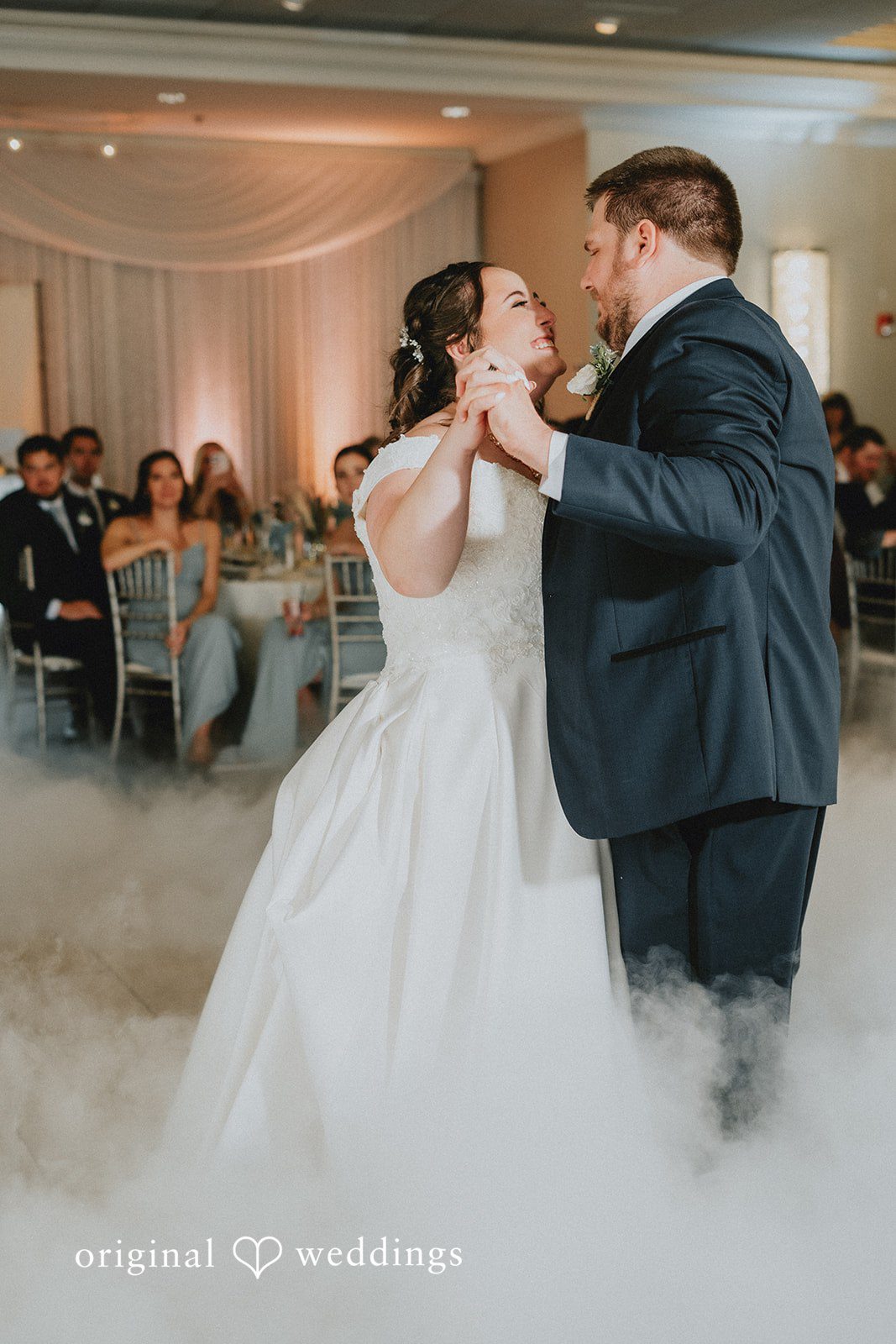 Kevin + Brooke Bride and groom sharing a romantic dance at The Seville
