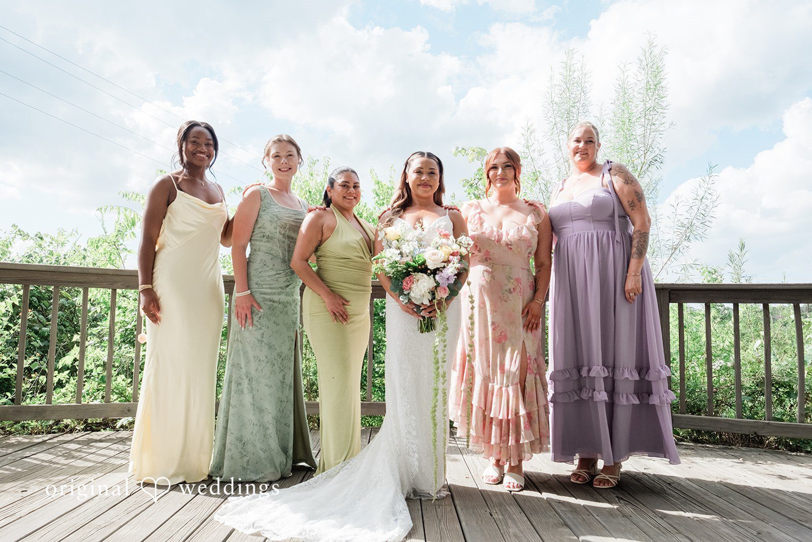 Lilly + Cade Bride Posing with the Bridesmaids Before the Ceremony at The Terrace Club