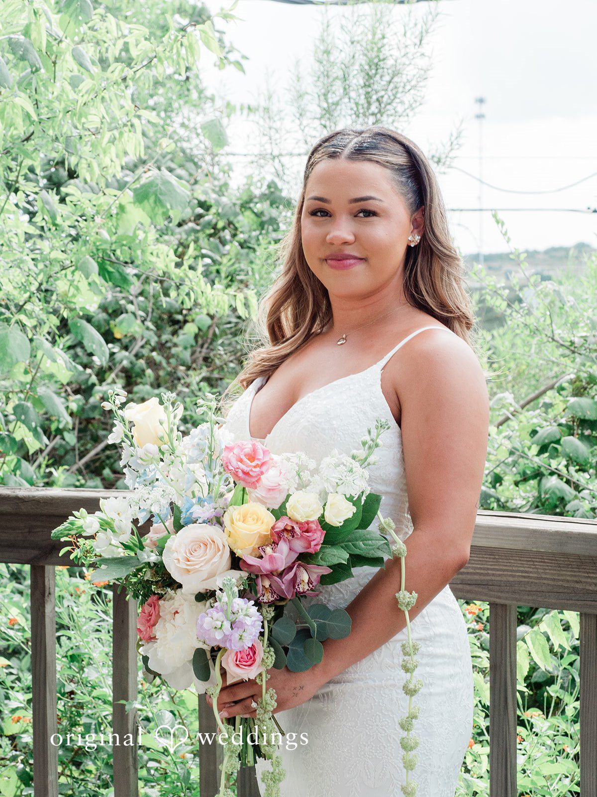 Lilly + Cade Elegant bridal portrait with fresh flowers at The Terrace Club.