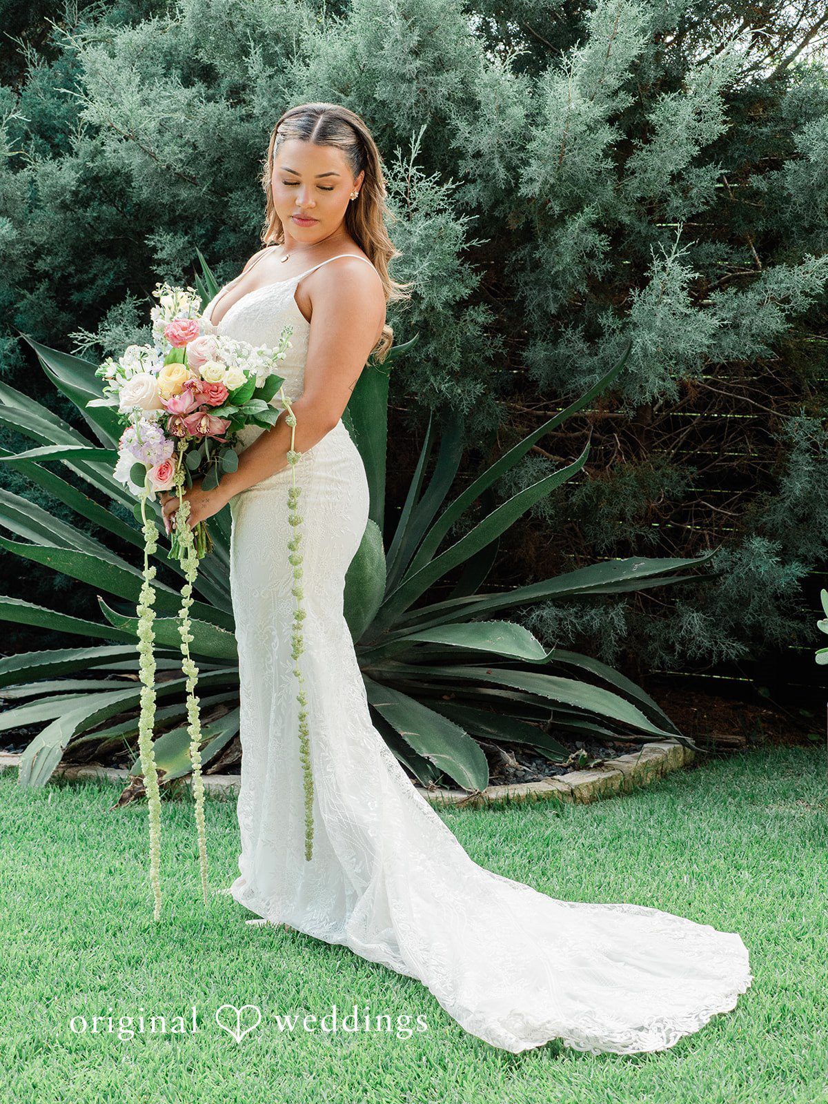 Lilly + Cade Bride posing with her bouquet at The Terrace Club captured by Austin Wedding Photographers from Original Weddings.