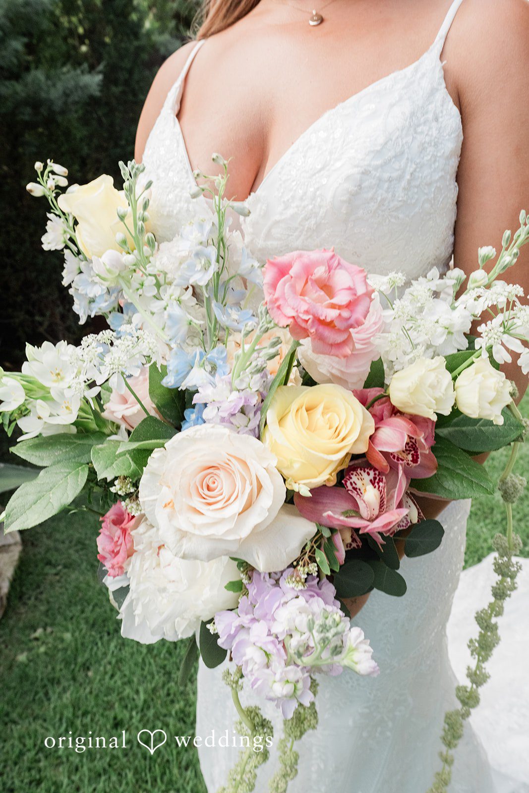 Lilly + Cade Close-up of bride holding her Bouquet at The Terrace Club