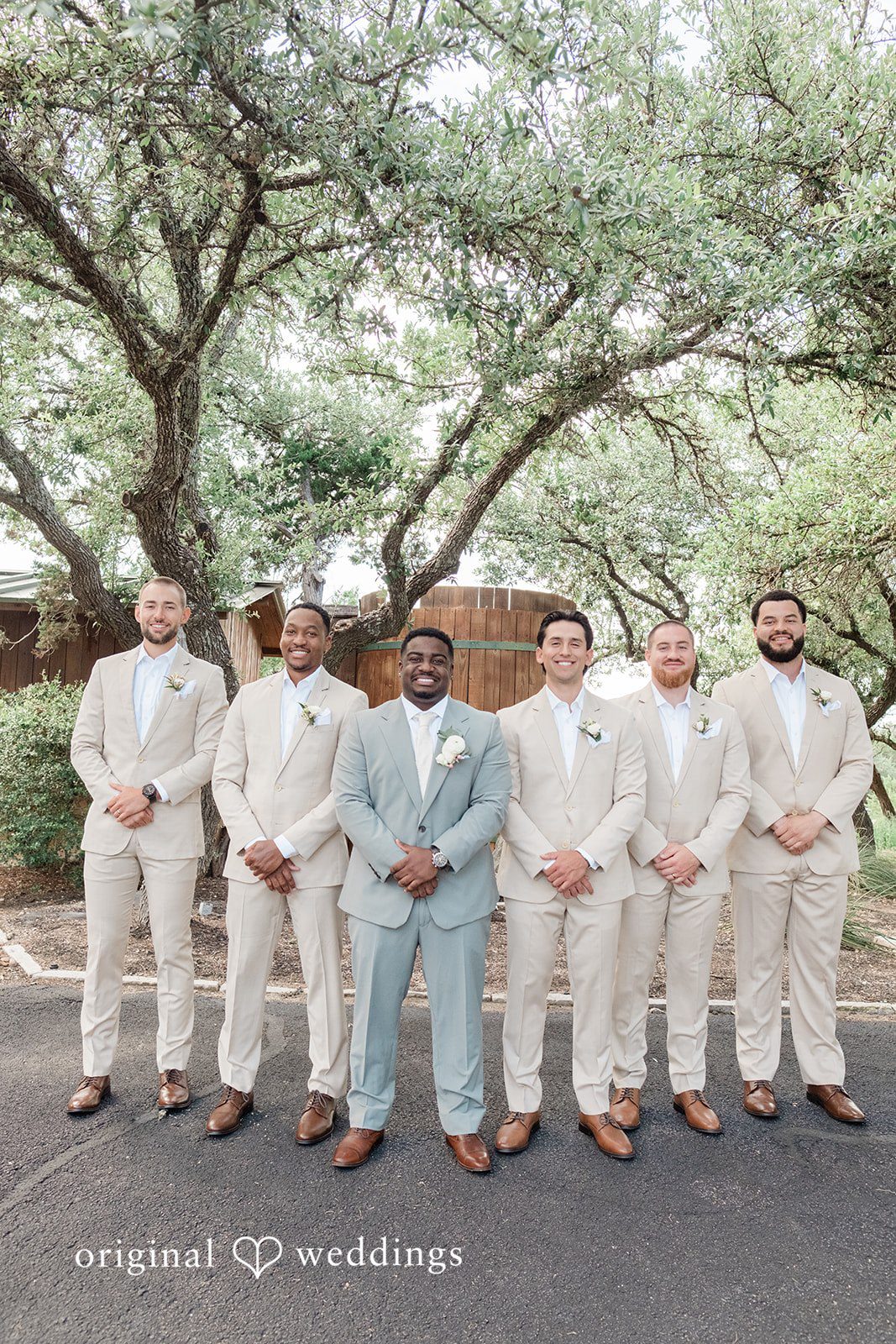 Lilly + Cade Groom Smiling with the Groomsmen Before the Ceremony at The Terrace Club