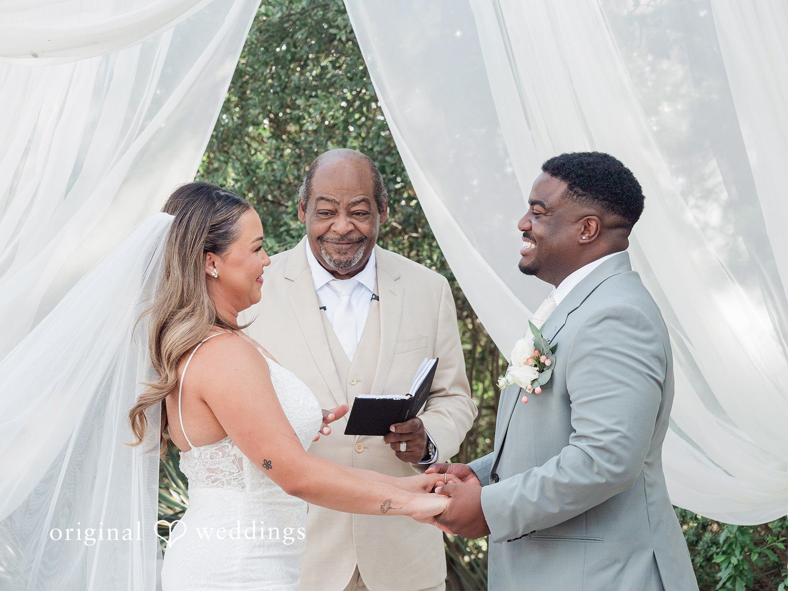Lilly + Cade Couple looking at each other with smiles at The Terrace Club captured by Austin Wedding Photographers from Original Weddings.