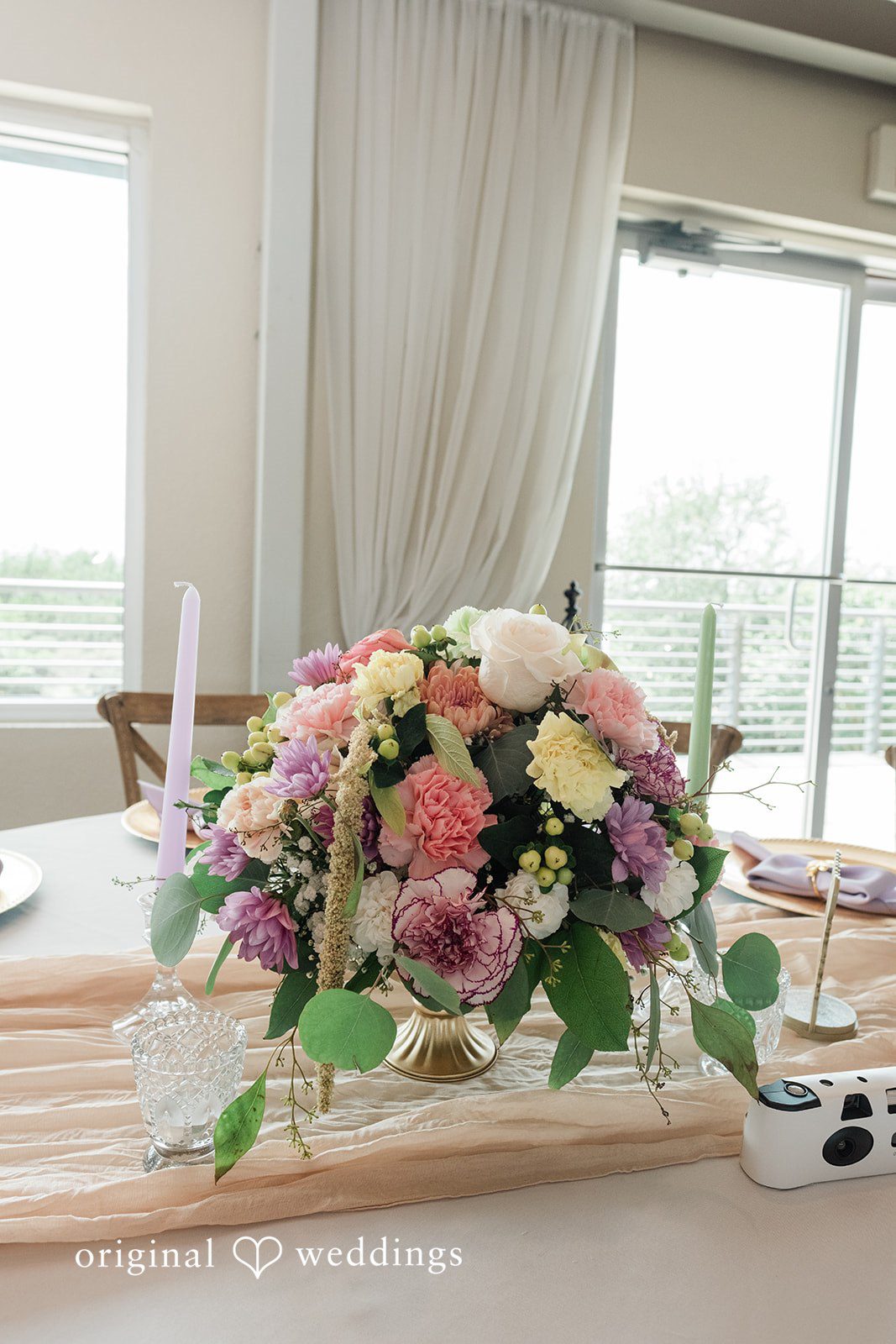 Lilly + Cade Beautiful reception decorations arranged inside The Terrace Club.
