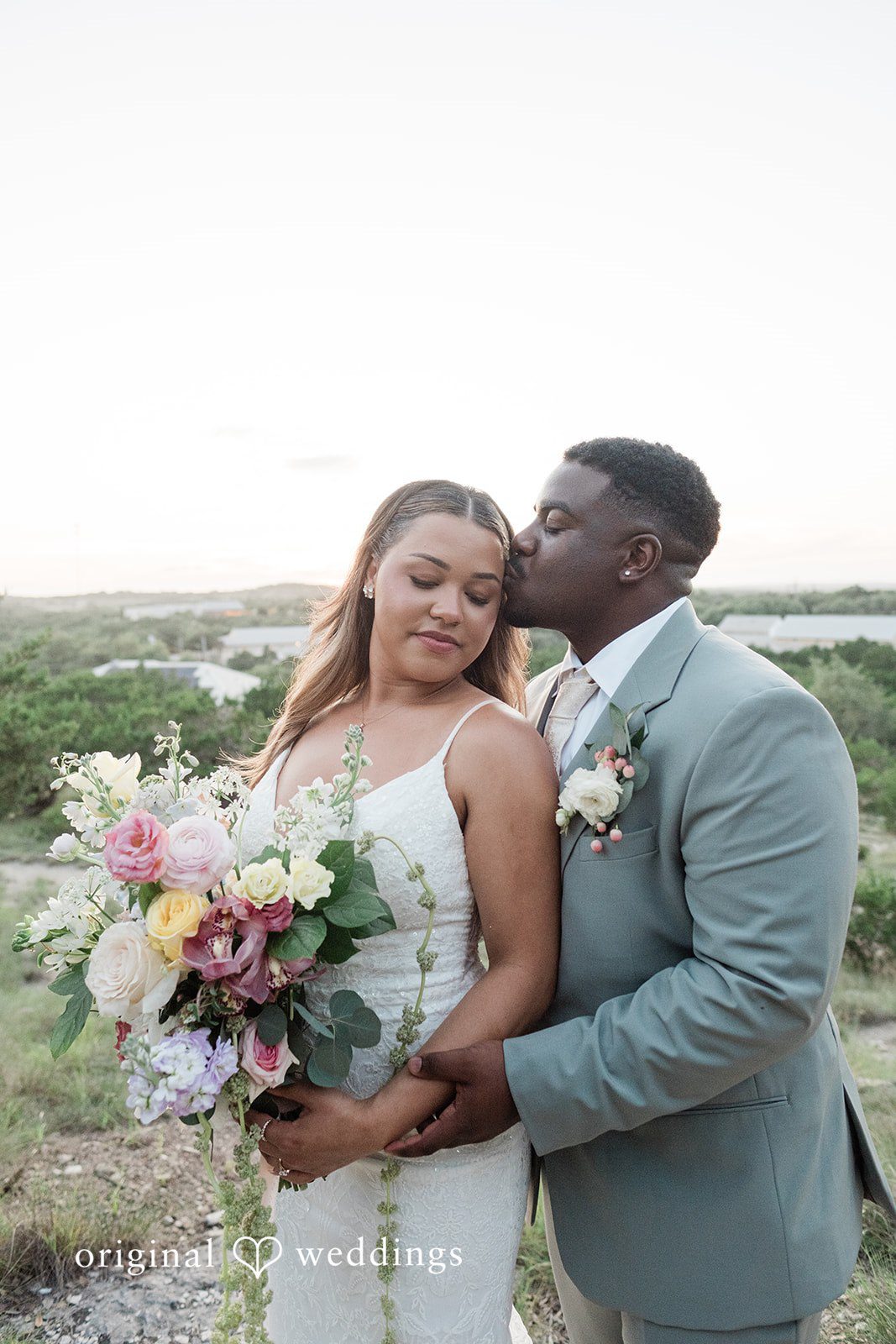 Lilly + Cade Romantic Forehead kiss moment of the Couple at The Terrace Club