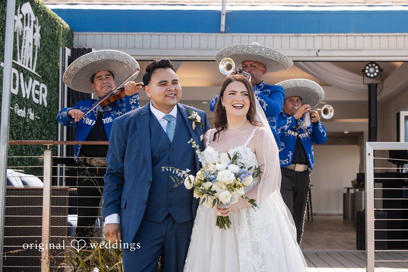 Kylie and Felipe’s Tower Beach Club wedding captured by Original Weddings San Diego Wedding Photographers with romantic beach portraits and timeless wedding moments.