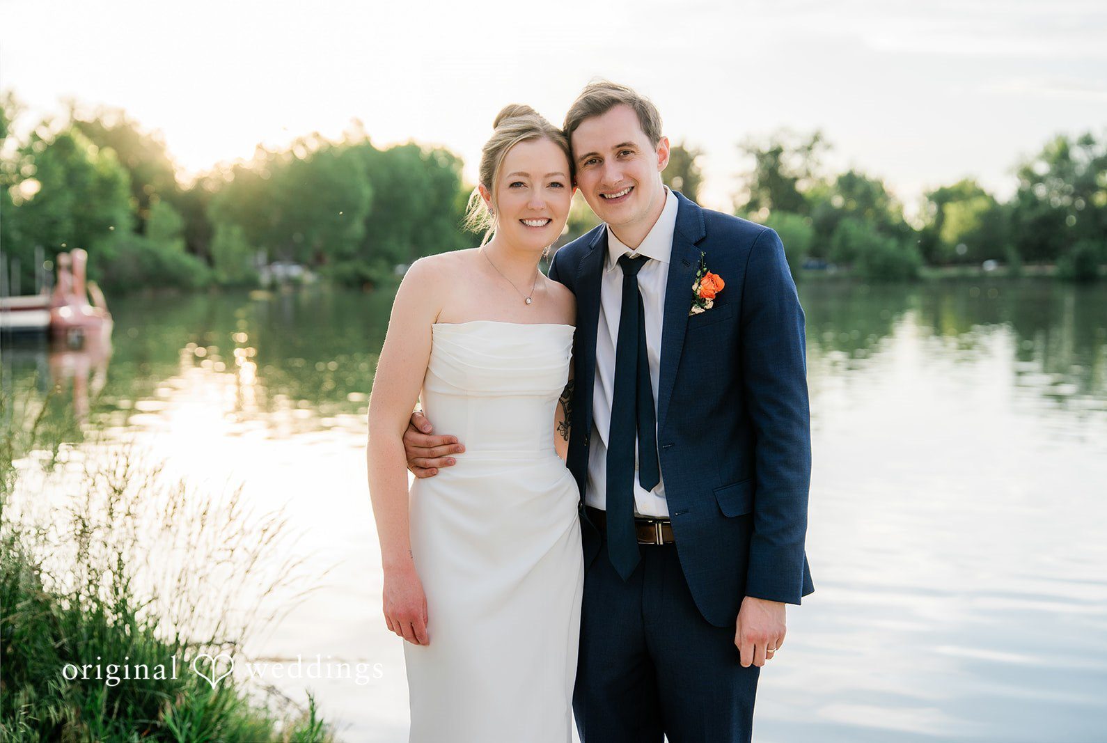 Stunning Portrait of couple at Washington Park Boat House by Denver Wedding Photographers from Original Weddings.