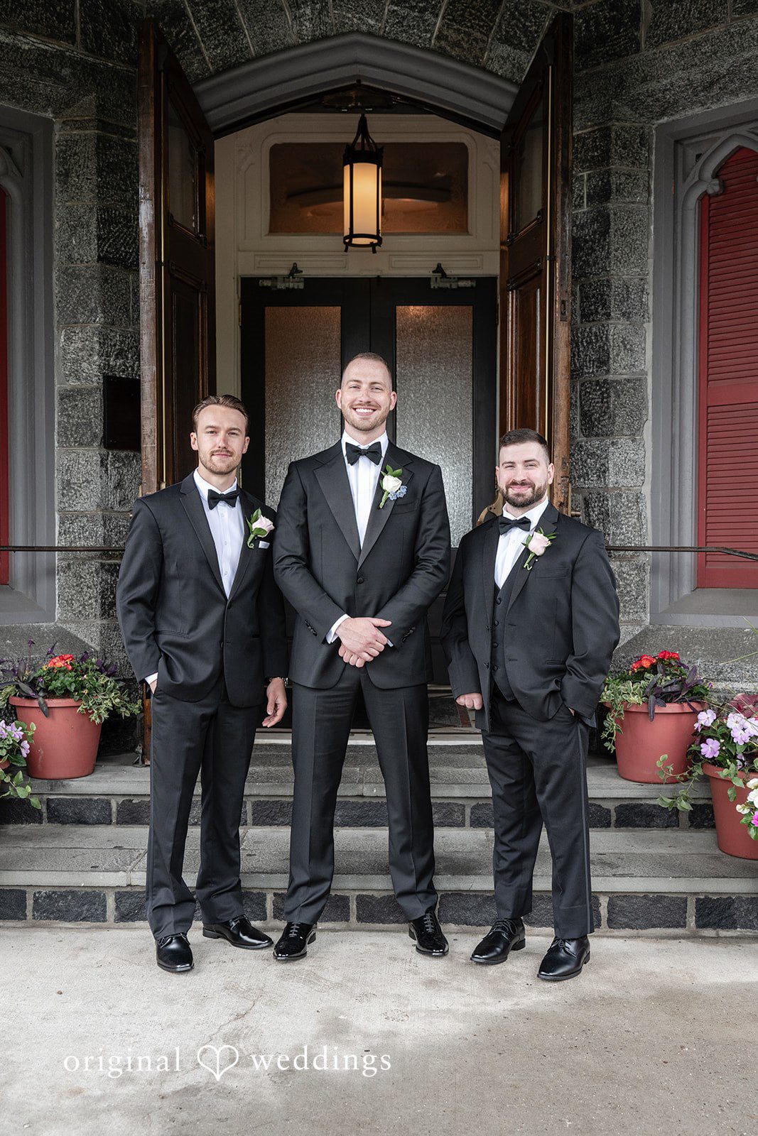 Christina + Christopher Groom posing with his groomsmen