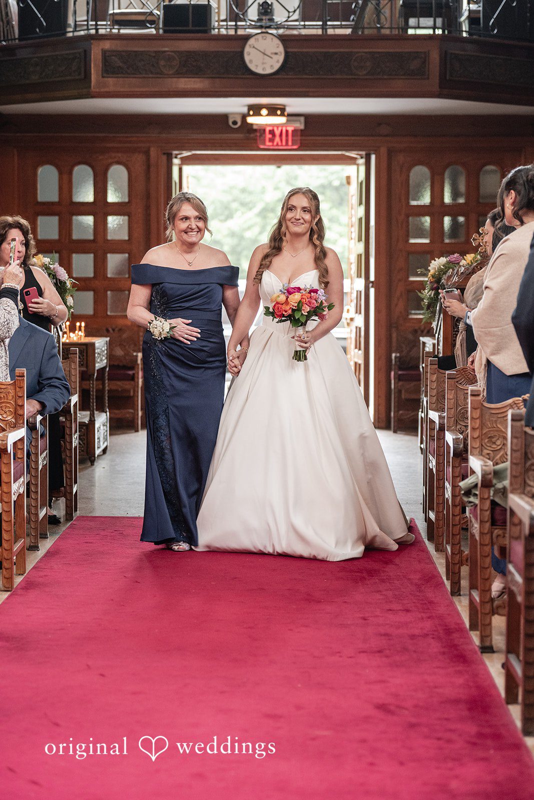 Christina + Christopher Bride walking into the ceremony with her mother