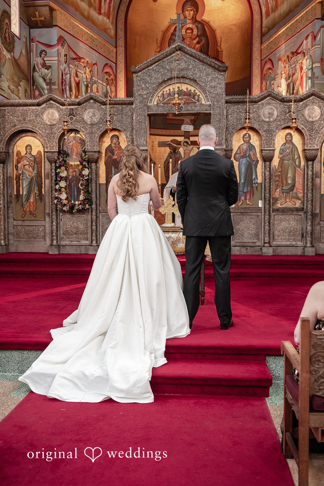 Christina + Christopher Bride and groom listening to vows from behind