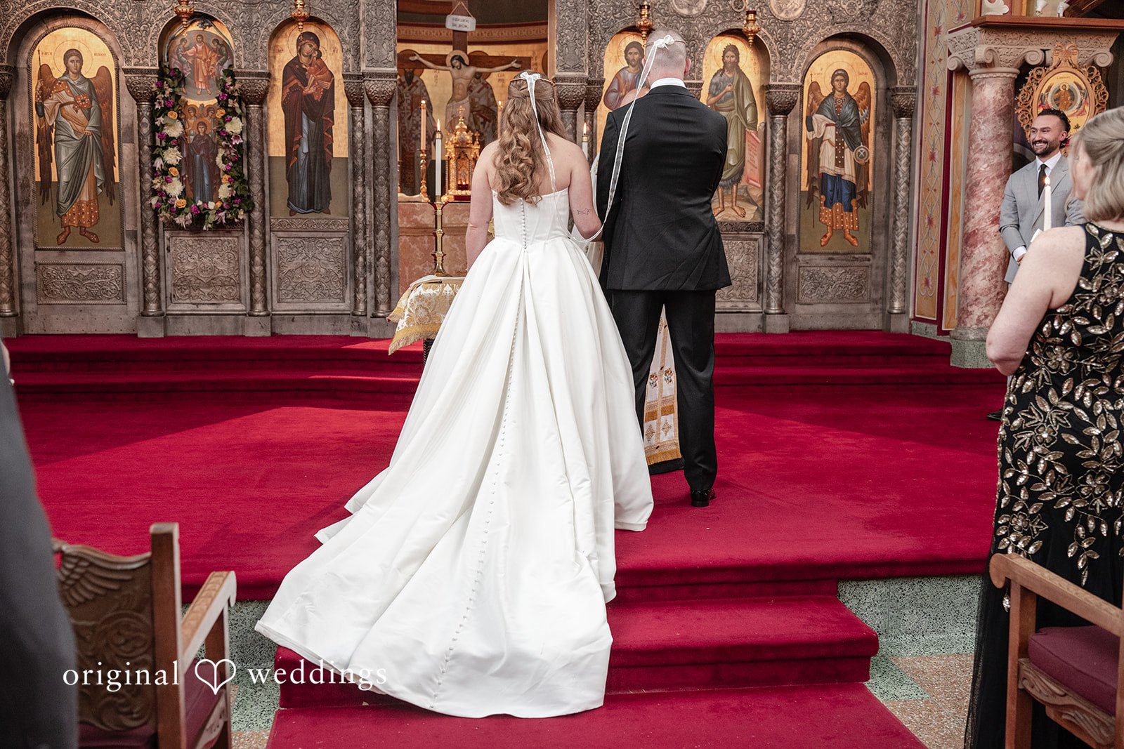 Christina + Christopher Wide ceremony view with guests and the newlyweds