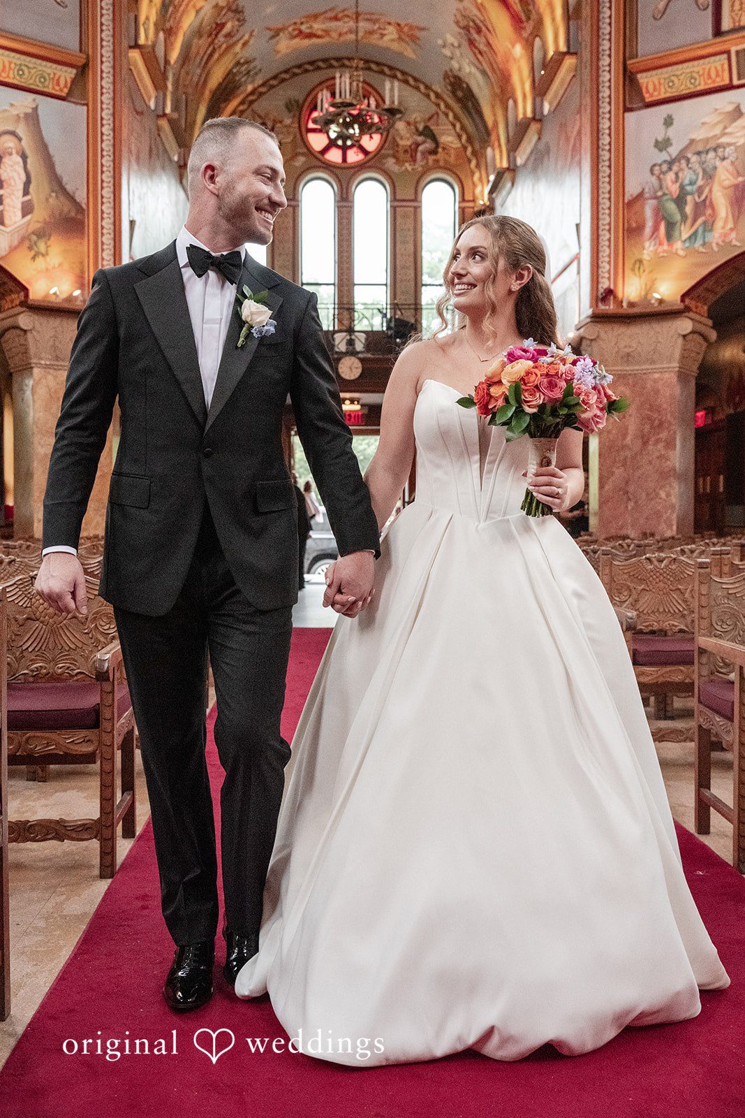 Christina + Christopher Bride and groom walking together after the ceremony