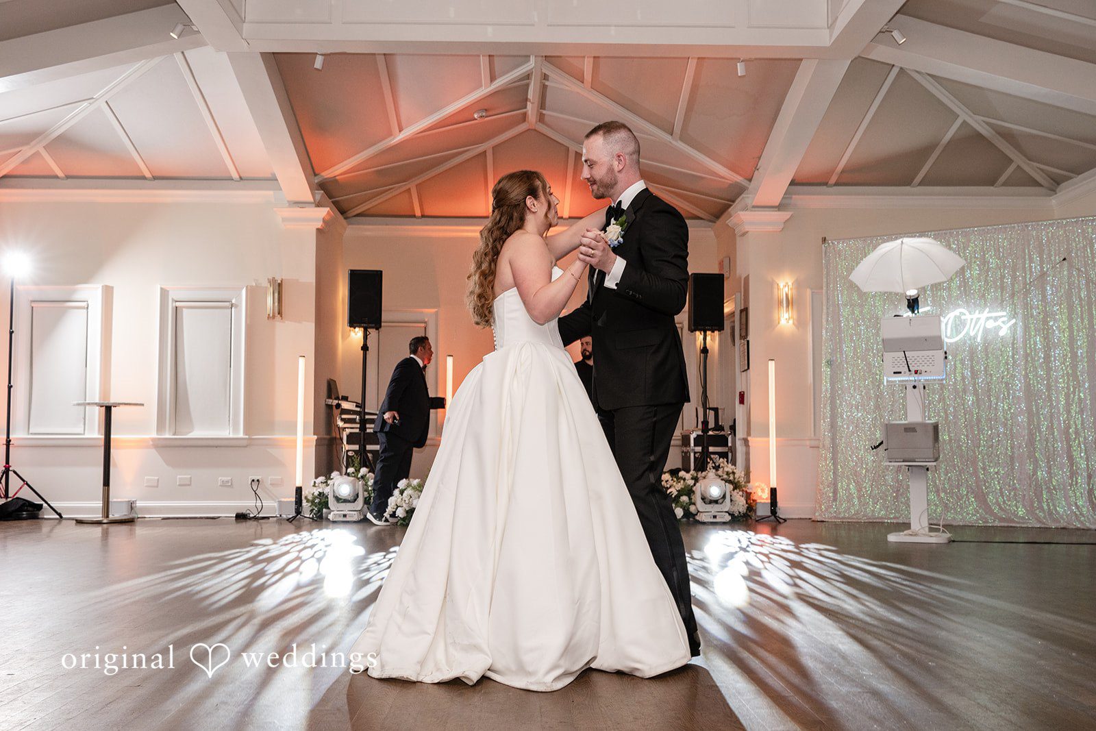 Christina + Christopher Bride and groom sharing their first dance at the reception