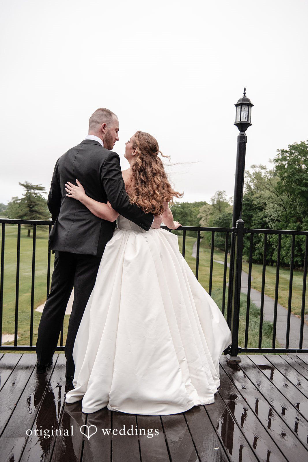 Christina + Christopher Bride and groom looking at each other from behind