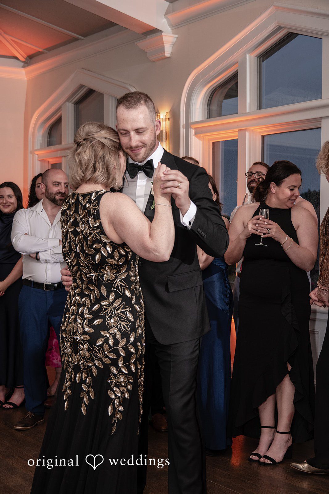 Christina + Christopher Groom dancing with his mother at the reception