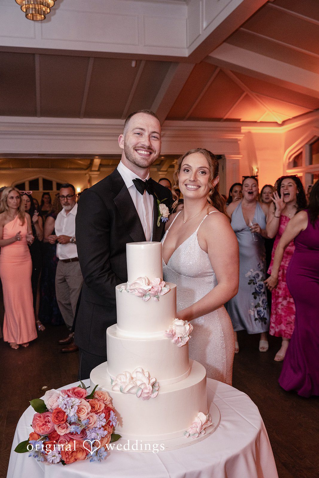 Christina + Christopher Bride and groom cutting their wedding cake
