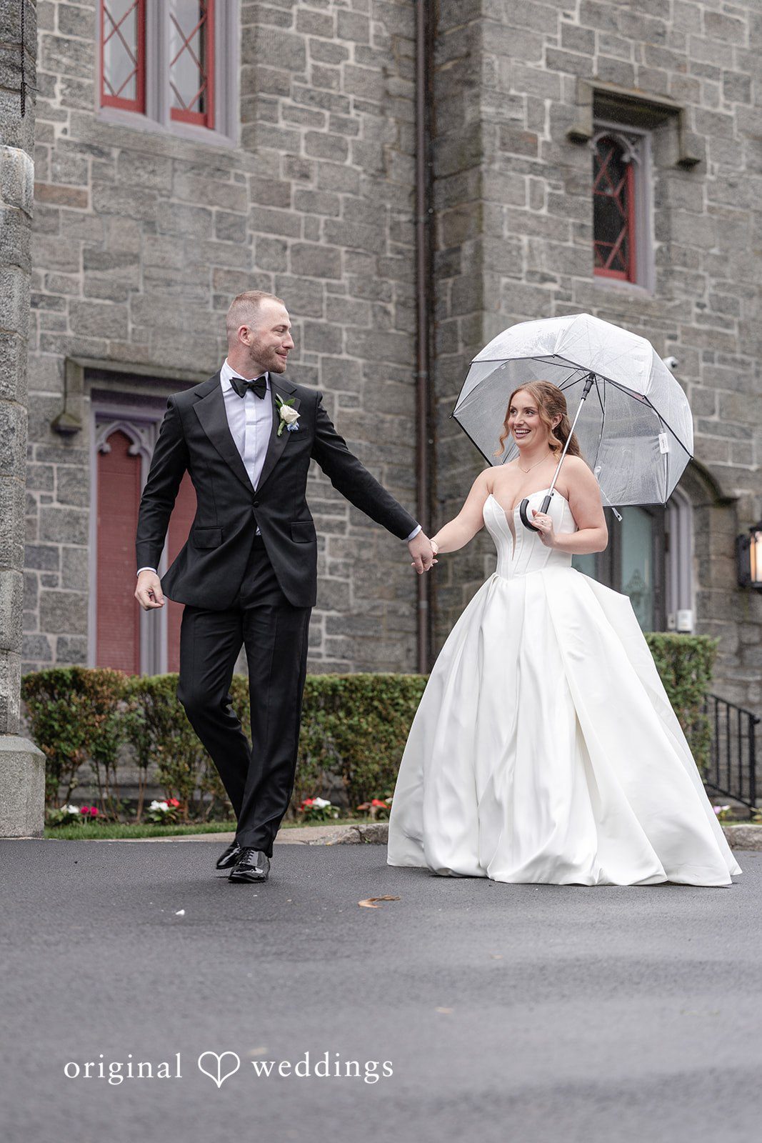 Christina + Christopher Bride and groom leaving Whitby Castle together at the end of the celebration
