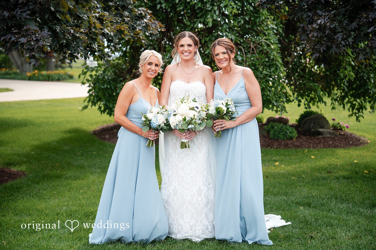 Bride with bridesmaids sharing joyful moments before the ceremony
