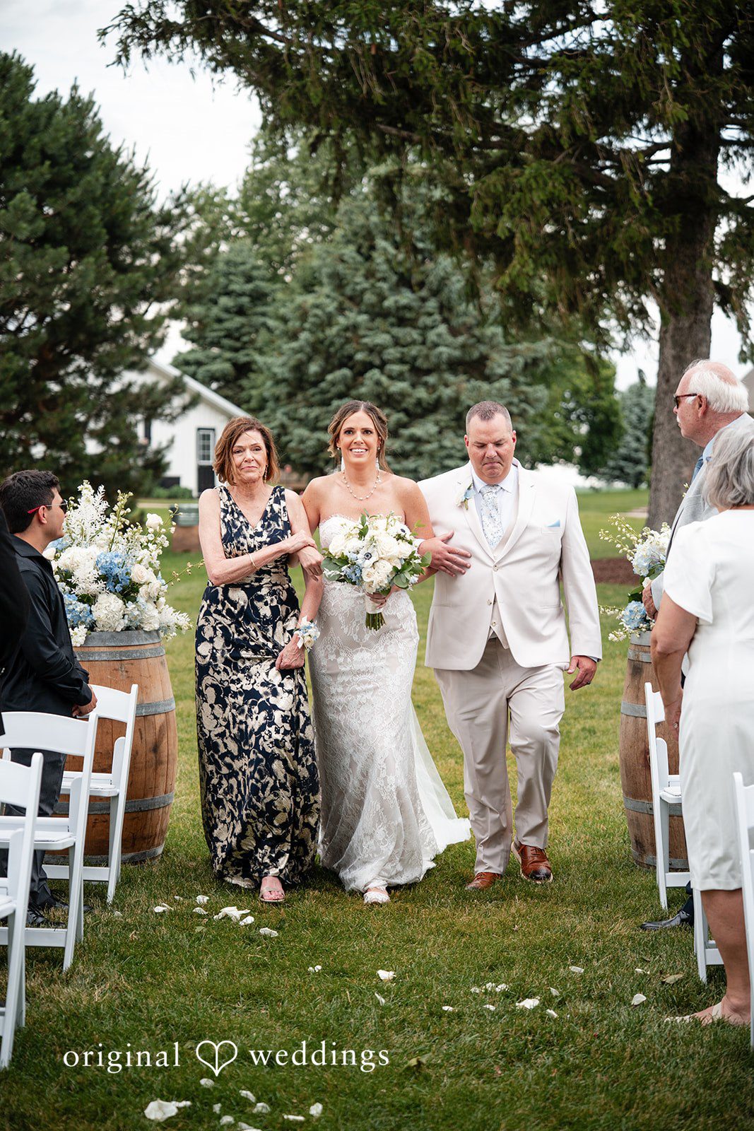 Bride walking down the aisle at White Stone Events