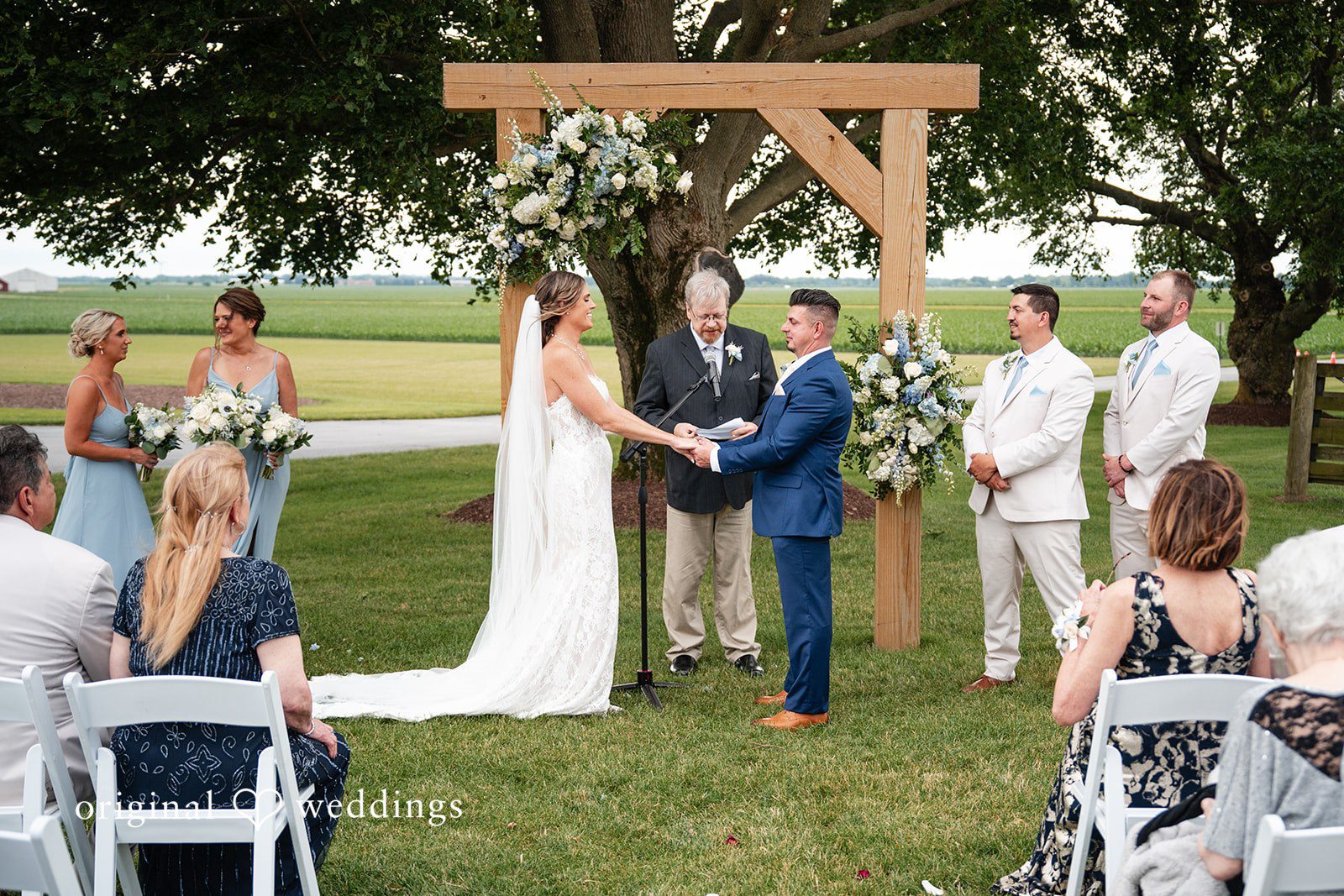Emotional wedding ceremony moment during vow exchange