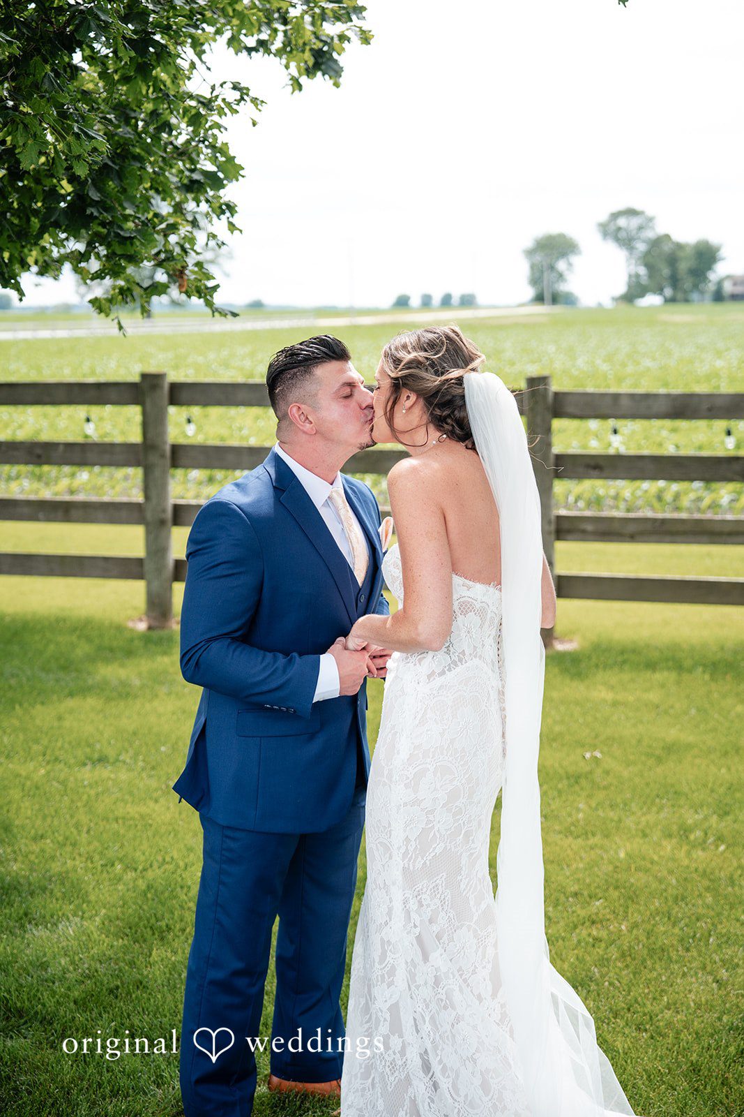 Bride and groom sharing their kiss at White Stone Events