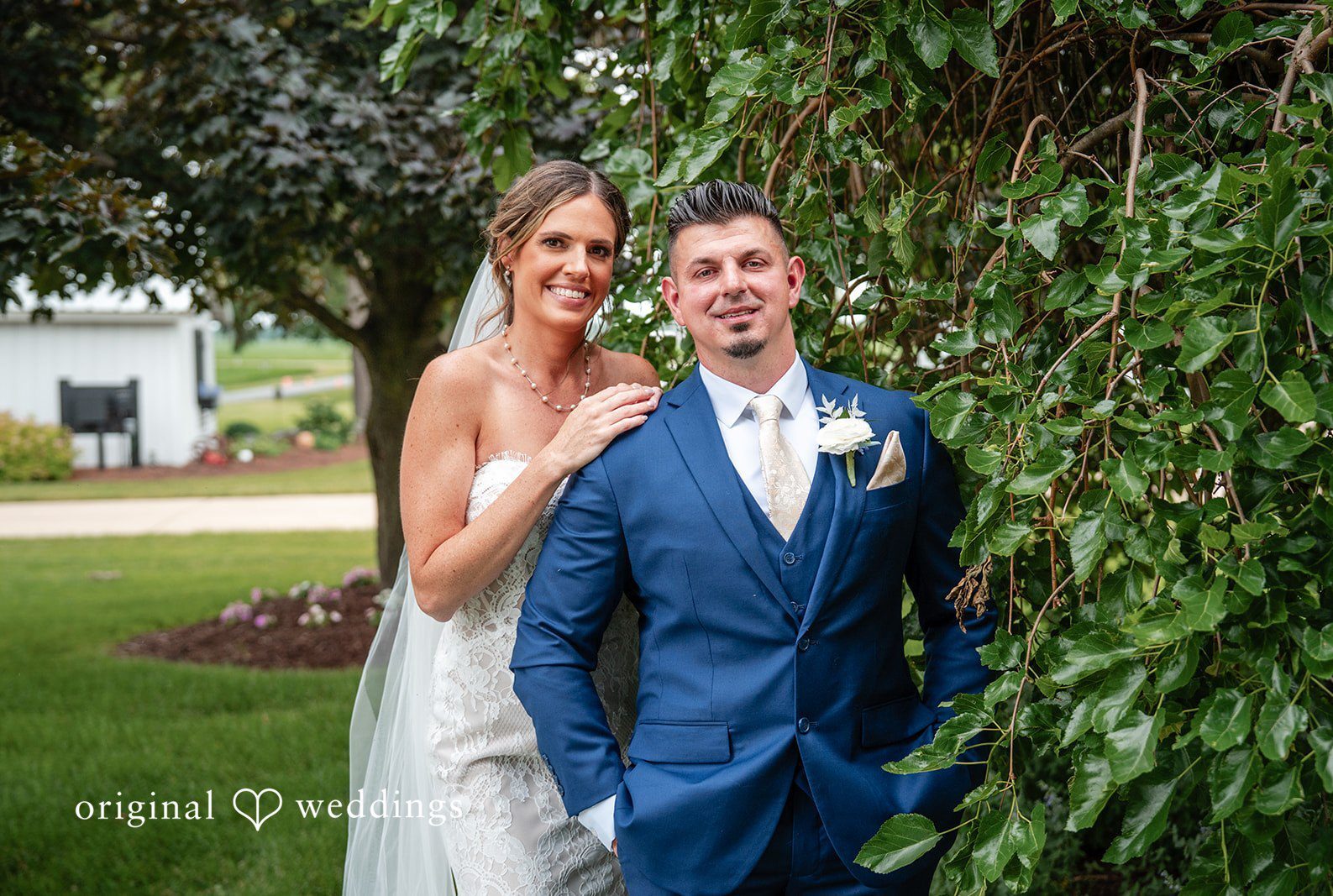 Elegant outdoor wedding picture at White Stone Events captured by Chicago Wedding Photographers from Original Weddings.