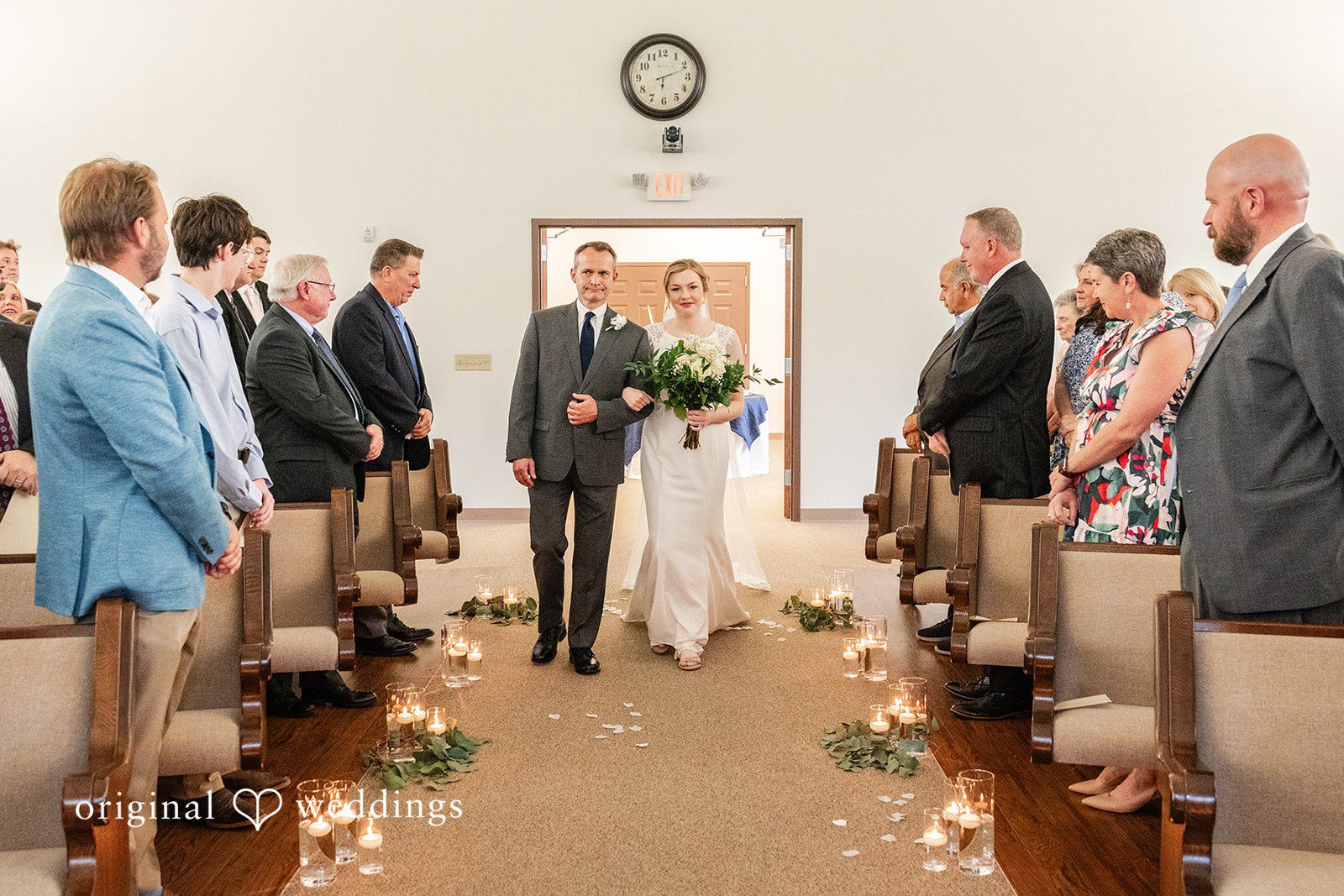 Anna Rose + Jacob The bride's father escorts the bride down the aisle