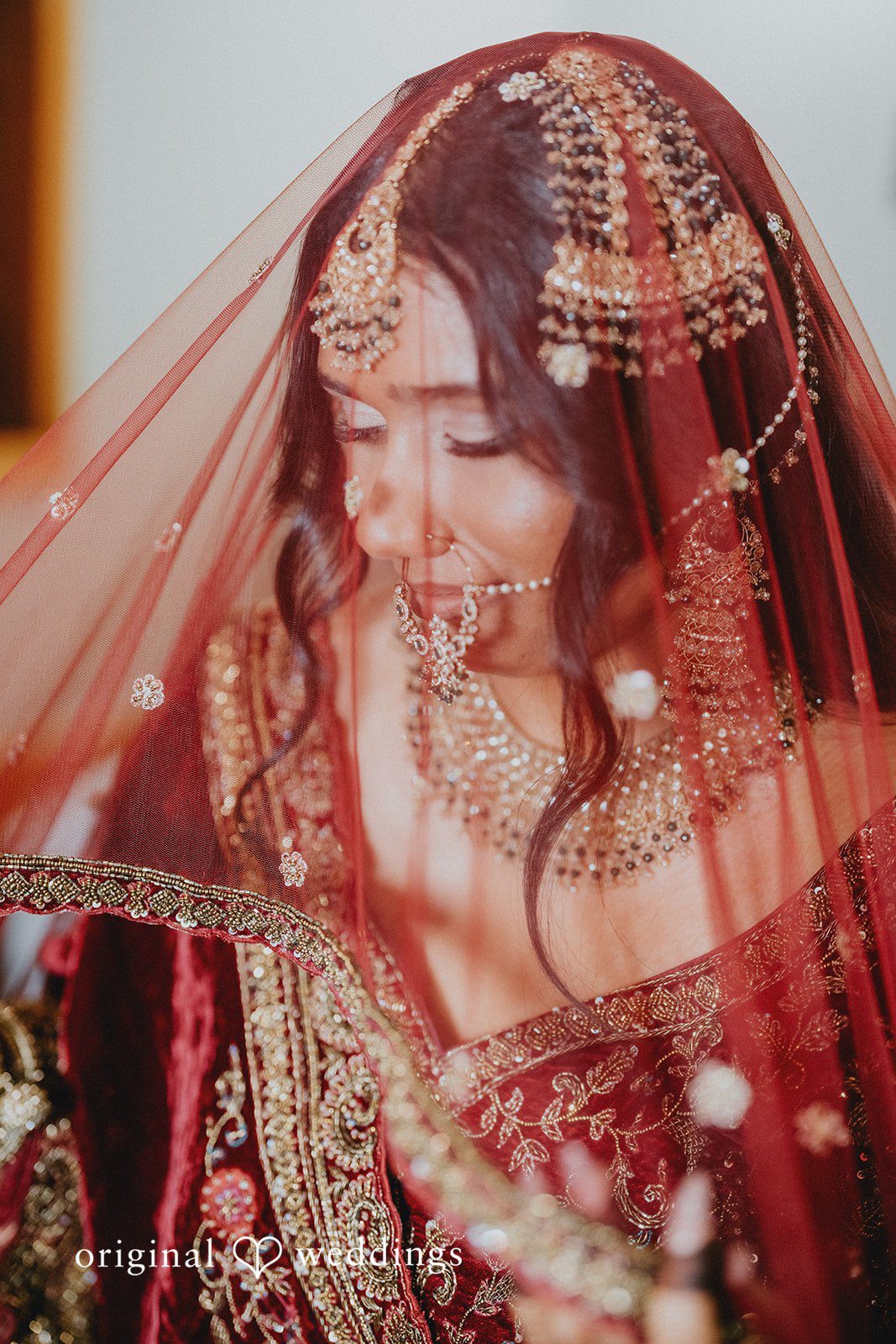 Bride posing gracefully before the wedding ceremony.